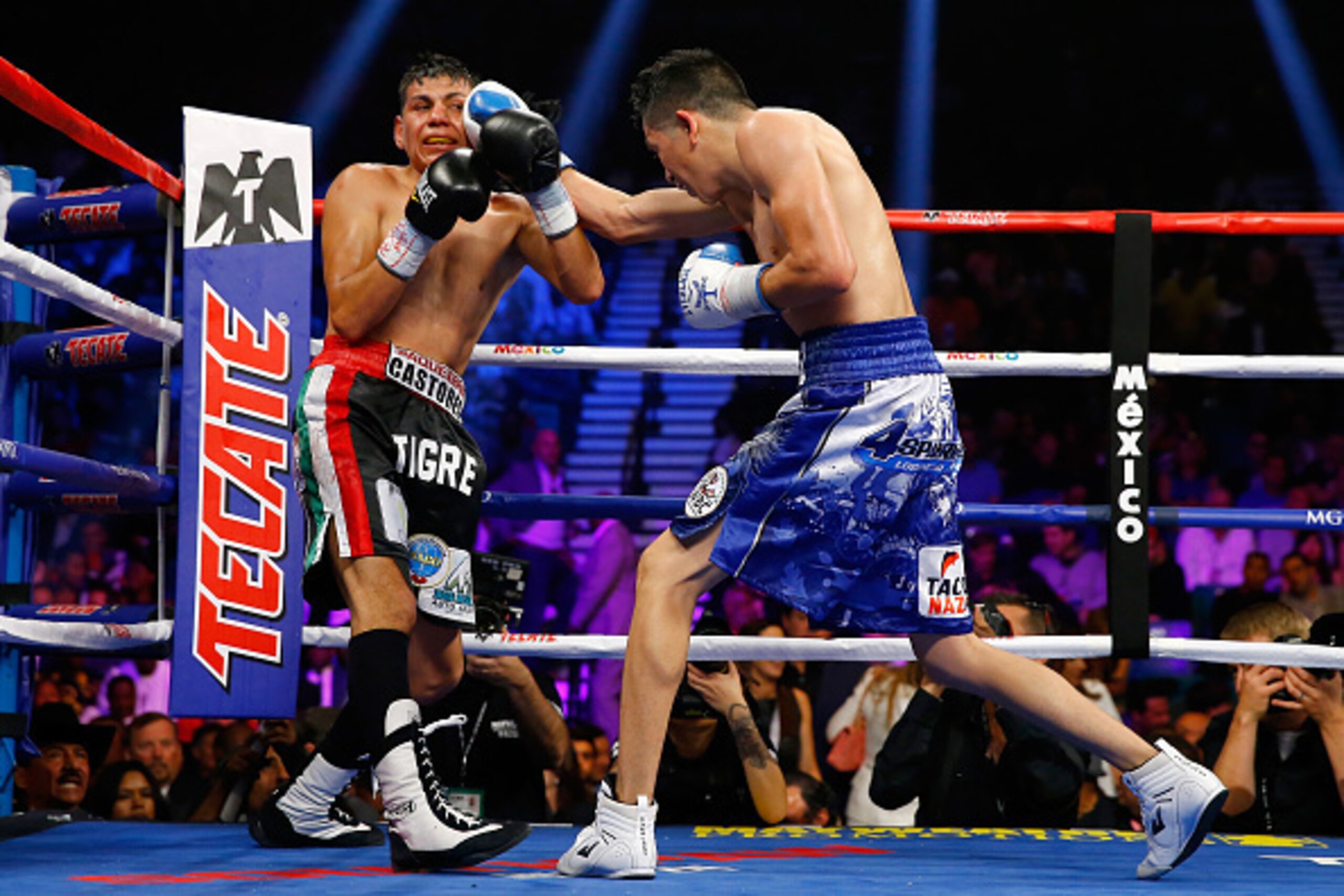LAS VEGAS, NV - MAY 02:  Leo Santa Cruz (R) throws a right at Jose Cayetano during their featherweight bout on May 2, 2015 at MGM Grand Garden Arena in Las Vegas, Nevada.  (Photo by Al Bello/Getty Images)