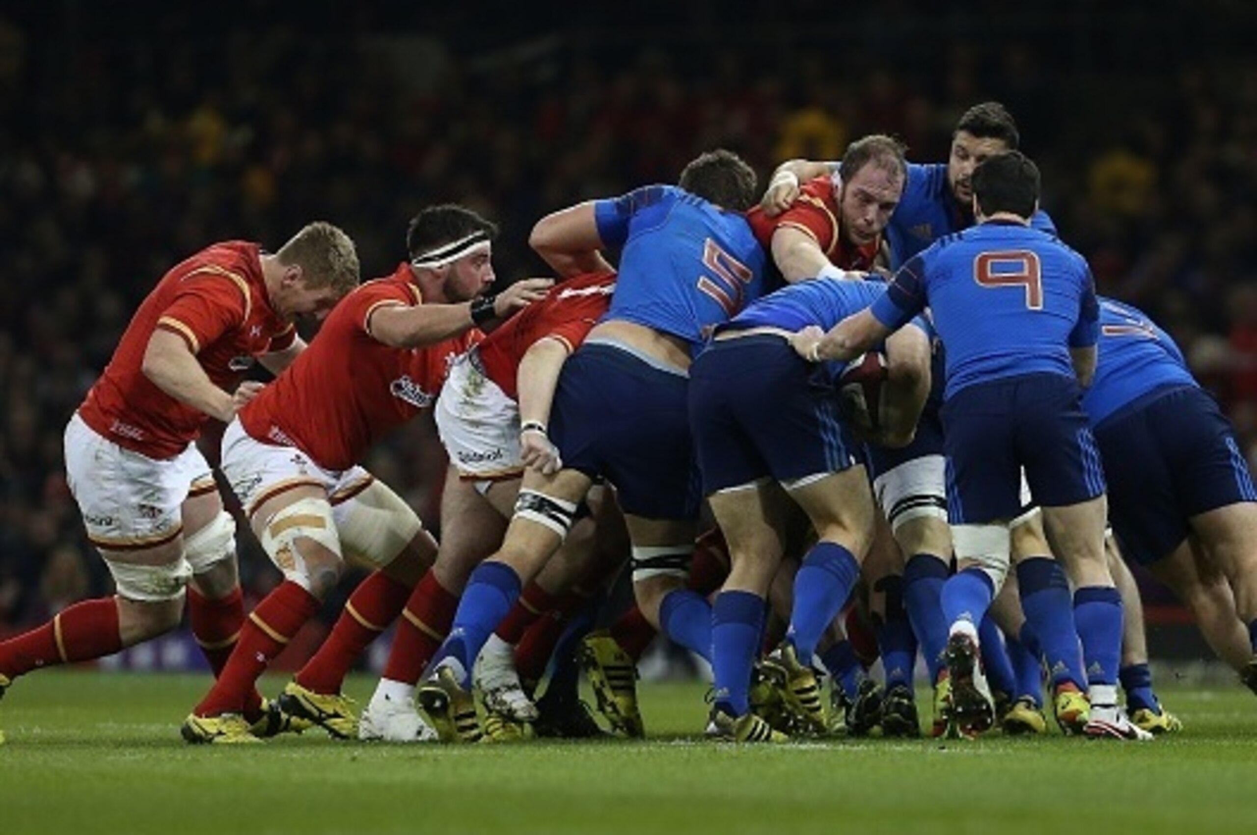 Wales' lock Alun Wyn Jones (4R) pushes in the scrum during the Six Nations international rugby union match between Wales and France at the Principality Stadium in Cardiff, south Wales, on February 26, 2016. / AFP / ADRIAN DENNIS / RESTRICTED TO EDITORIAL 