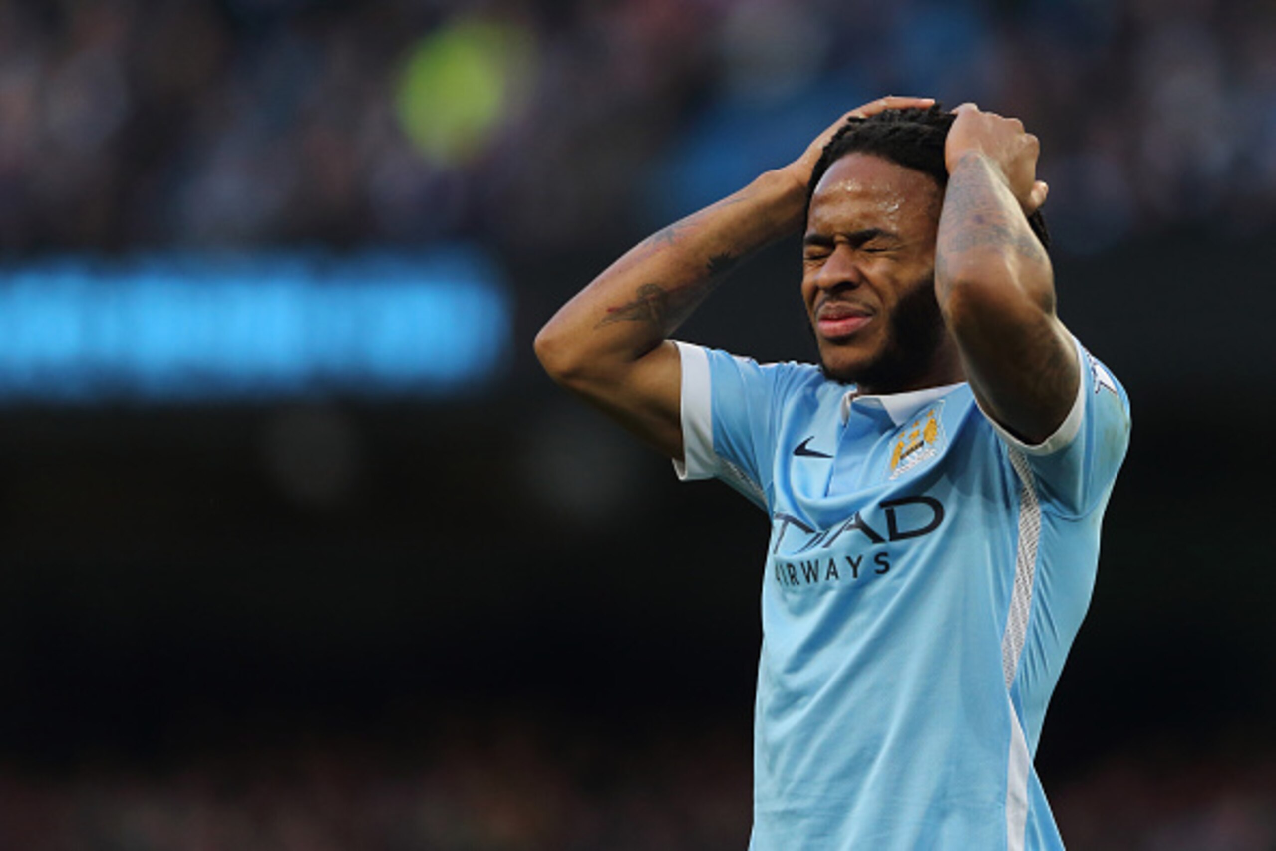 MANCHESTER, ENGLAND - FEBRUARY 14 :  Raheem Sterling of Manchester City reacts after missing a first half chance during the Barclays Premier League match between Manchester City and Tottenham Hotsput at the Etihad Stadium Bloomfield Road on February 14, 2