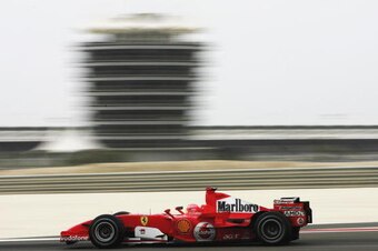 AL MANAMHA, BAHRAIN - MARCH 11:  Michael Schumacher of Germany and Ferrari in action during qualifying for the Bahrain Formula One Grand Prix at the Bahrain International Circuit on March 11, 2006 in Sakhir, Bahrain.  (Photo by Clive Mason/Getty Images)