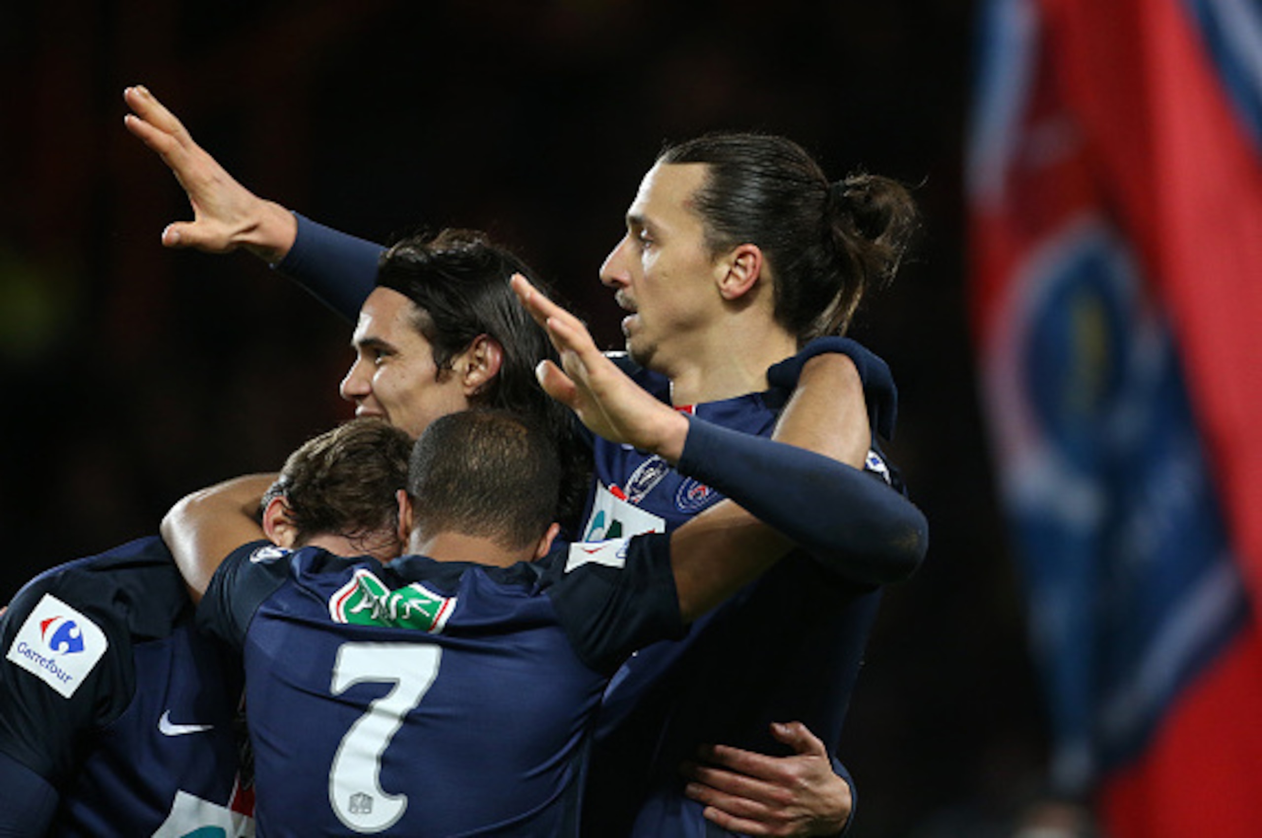 PARIS - FEBRUARY 10: Zlatan Ibrahimovic of PSG celebrates scoring the third goal with Edinson Cavani of PSG (left) during the French Cup (Coupe de France) match between Paris Saint-Germain (PSG) and Olympique Lyonnais (OL) at Parc des Princes stadium on F