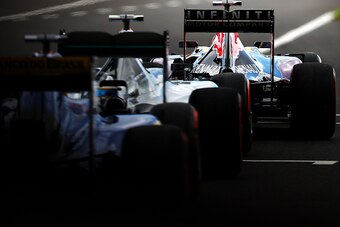 SUZUKA, JAPAN - SEPTEMBER 26:  Daniel Ricciardo of Australia and Infiniti Red Bull Racing waits to exit the pit lane during final practice for the Formula One Grand Prix of Japan at Suzuka Circuit on September 26, 2015 in Suzuka.  (Photo by Dan Istitene/G