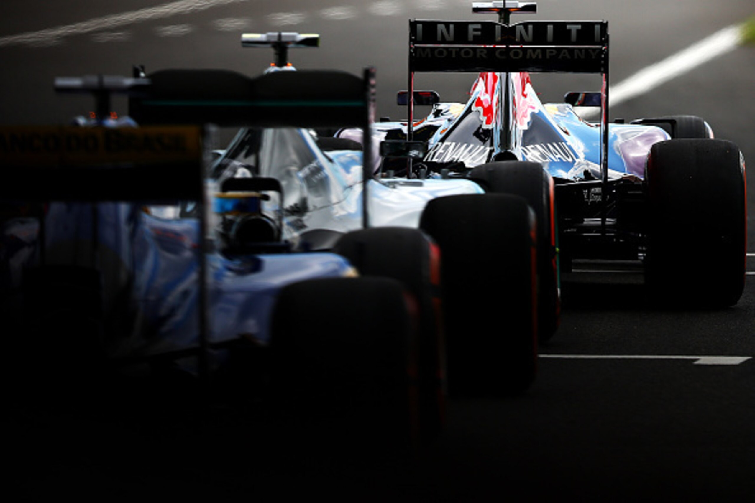 SUZUKA, JAPAN - SEPTEMBER 26:  Daniel Ricciardo of Australia and Infiniti Red Bull Racing waits to exit the pit lane during final practice for the Formula One Grand Prix of Japan at Suzuka Circuit on September 26, 2015 in Suzuka.  (Photo by Dan Istitene/G