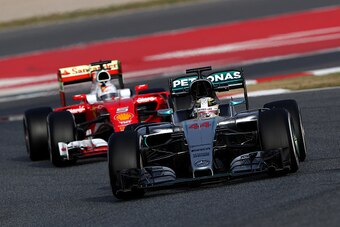 MONTMELO, SPAIN - FEBRUARY 22:  Lewis Hamilton of Great Britain and Mercedes GP drives ahead of Sebastian Vettel of Germany and Ferrari during day one of F1 winter testing at Circuit de Catalunya on February 22, 2016 in Montmelo, Spain.  (Photo by Mark Th