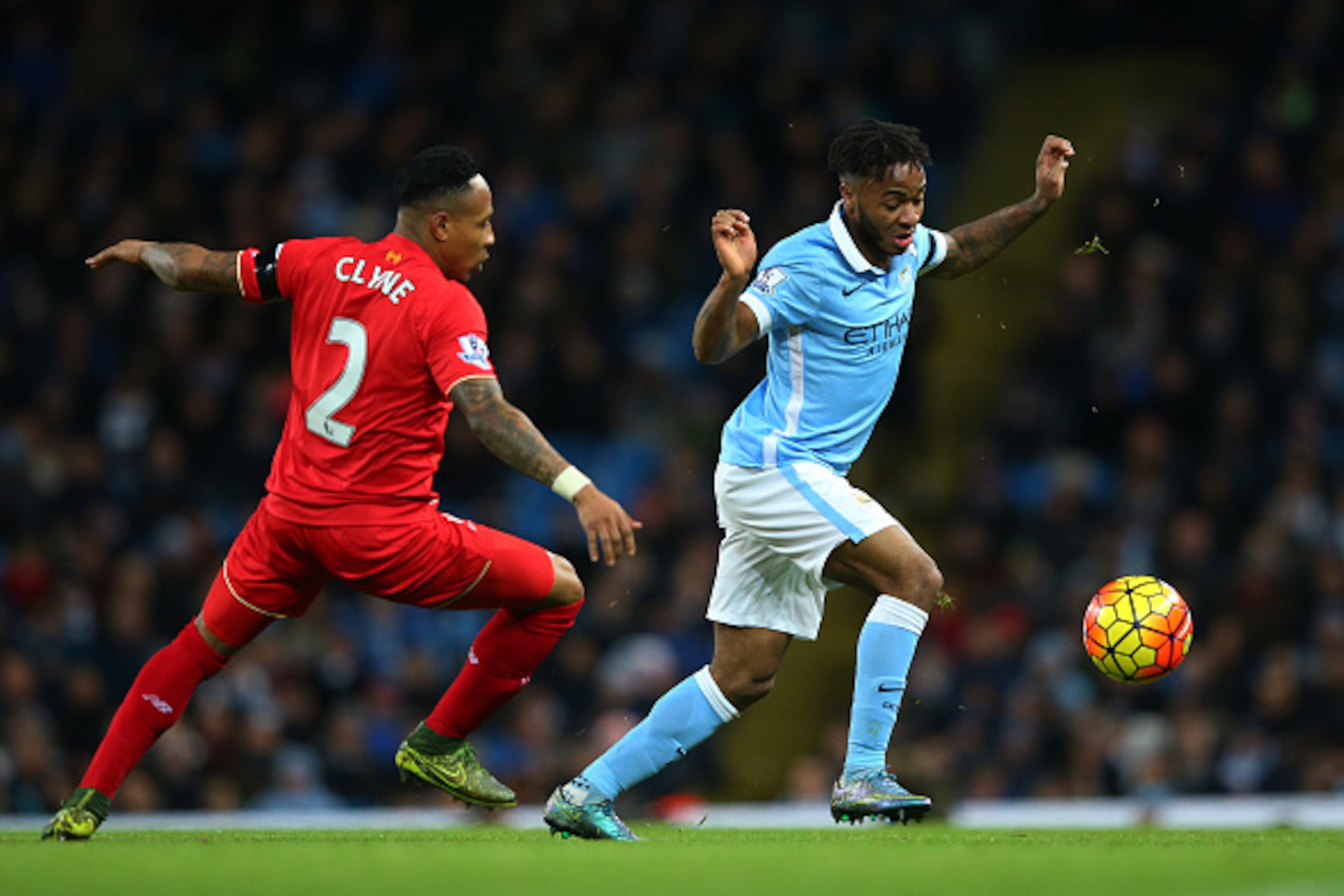 MANCHESTER, ENGLAND - NOVEMBER 21:  Raheem Sterling of Manchester City and Nathaniel Clyne of Liverpool compete for the ball during the Barclays Premier League match between Manchester City and Liverpool at Etihad Stadium on November 21, 2015 in Mancheste