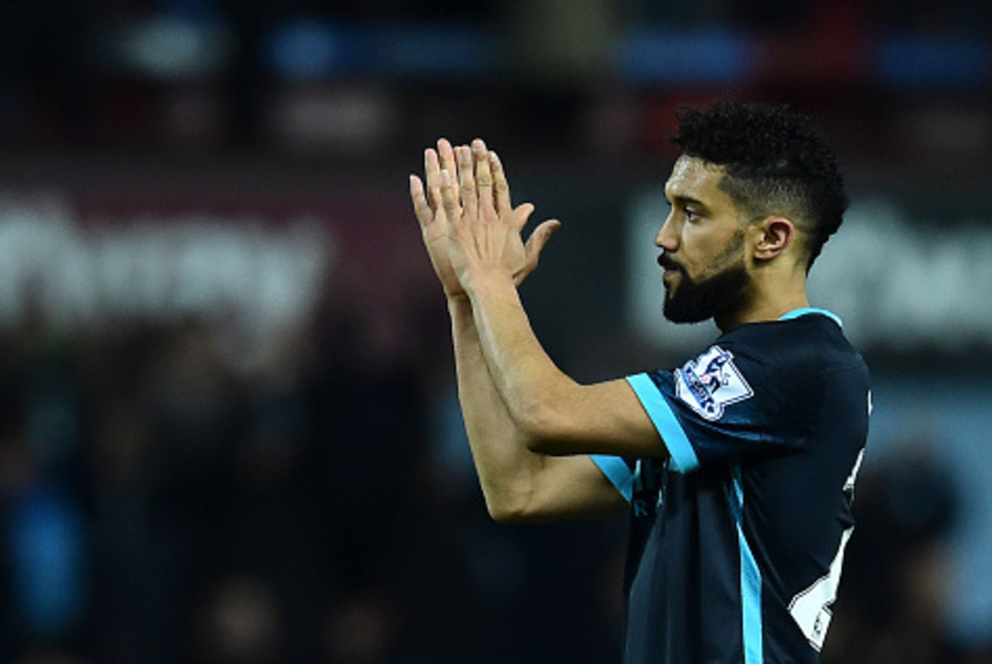 Manchester City's French defender Gael Clichy applauds after the final whistle during the English Premier League football match between West Ham United and Manchester City at The Boleyn Ground in Upton Park, in east London on January 23, 2016. AFP PHOTO /