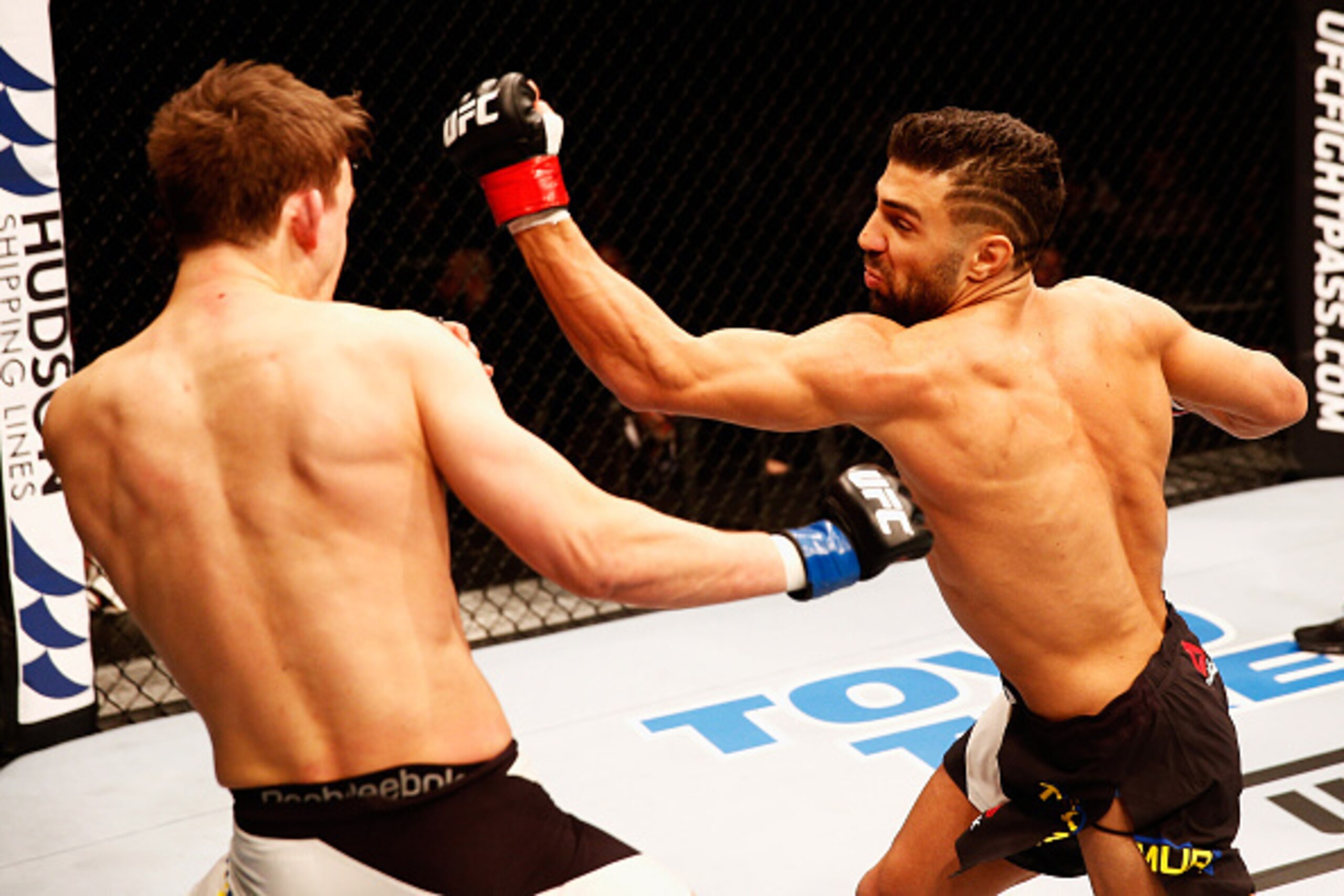 LONDON, ENGLAND - FEBRUARY 27:  David Teymur of Sweden and Martin Svensson of Sweden compete in their Lightweight bout during the UFC Fight Night held at at Indigo at The O2 Arena on February 27, 2016 in London, England.  (Photo by Dean Mouhtaropoulos/Zuf
