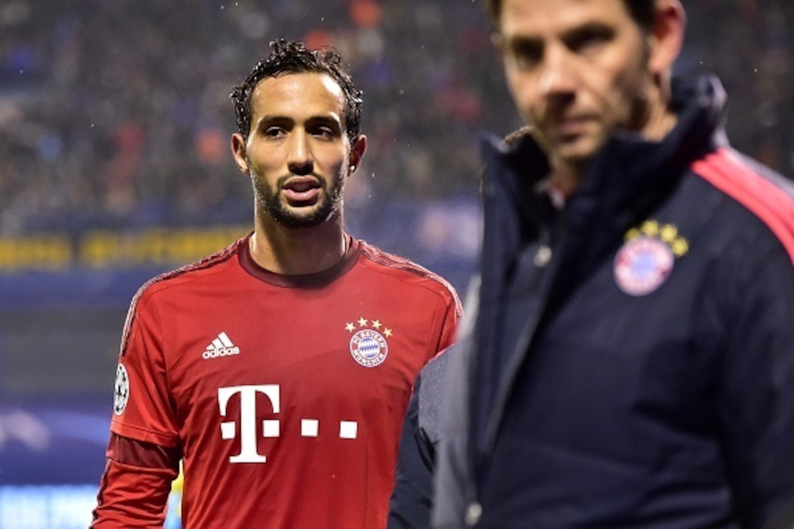 Bayern Munich's Moroccan striker Medhi Benatia (L) leaves the pitch at half time during the UEFA Champions League football match between Dinamo Zagreb v Bayern Munich at the Maksimir stadium in Zagreb on December 9, 2015. AFP PHOTO / ANDREJ ISAKOVIC / AFP Bayern Munich's Moroccan striker Medhi Benatia (L) leaves the pitch at half time during the UEFA Champions League football match between Dinamo Zagreb v Bayern Munich at the Maksimir stadium in Zagreb on December 9, 2015. AFP PHOTO / ANDREJ ISAKOVIC / AFP