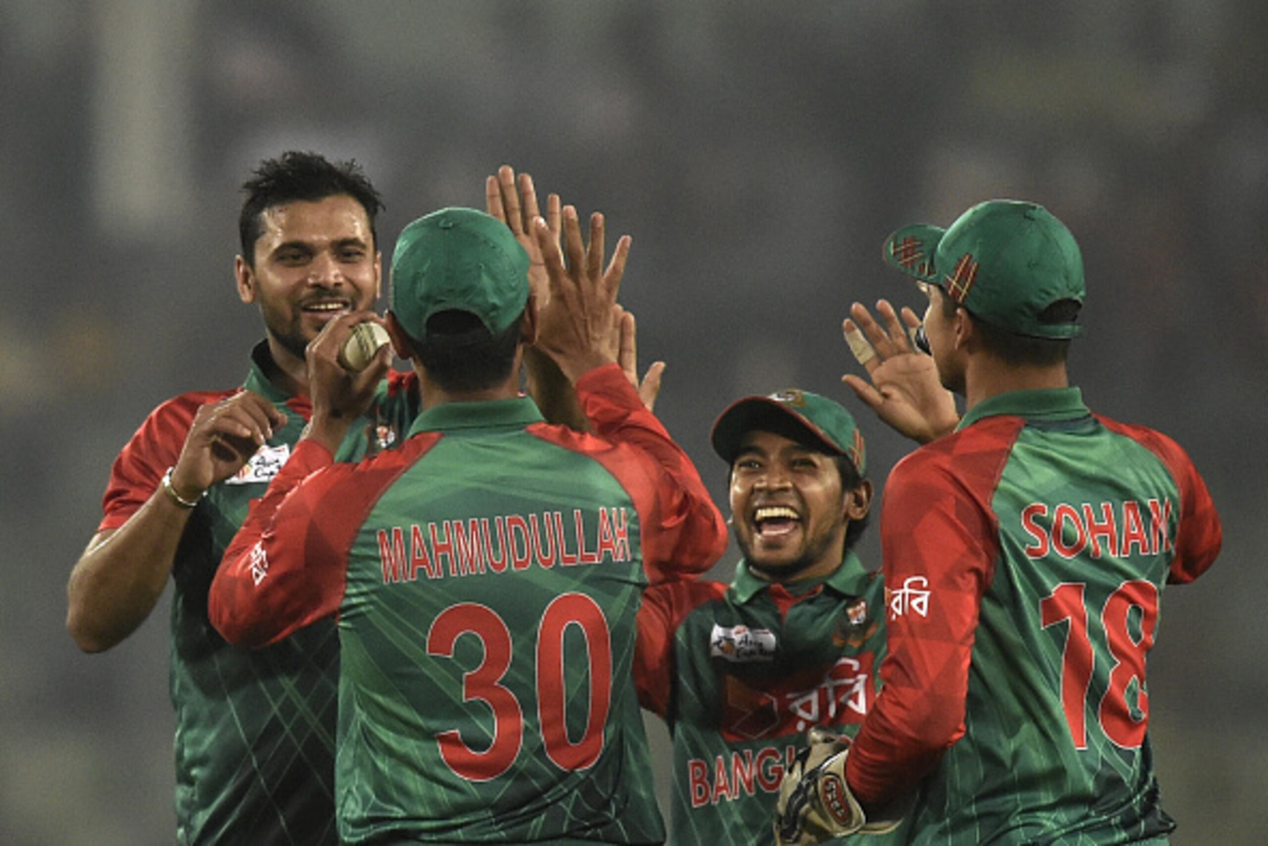 Bangladesh cricket captain Mashrafe Bin Mortaza (L) celebrates with teammates after the dismissal of the United Arab Emirates cricketer Shaiman Anwar during the match between Bangladesh and United Arab Emirates at the Asia Cup T20 cricket tournament at th Bangladesh cricket captain Mashrafe Bin Mortaza (L) celebrates with teammates after the dismissal of the United Arab Emirates cricketer Shaiman Anwar during the match between Bangladesh and United Arab Emirates at the Asia Cup T20 cricket tournament at th
