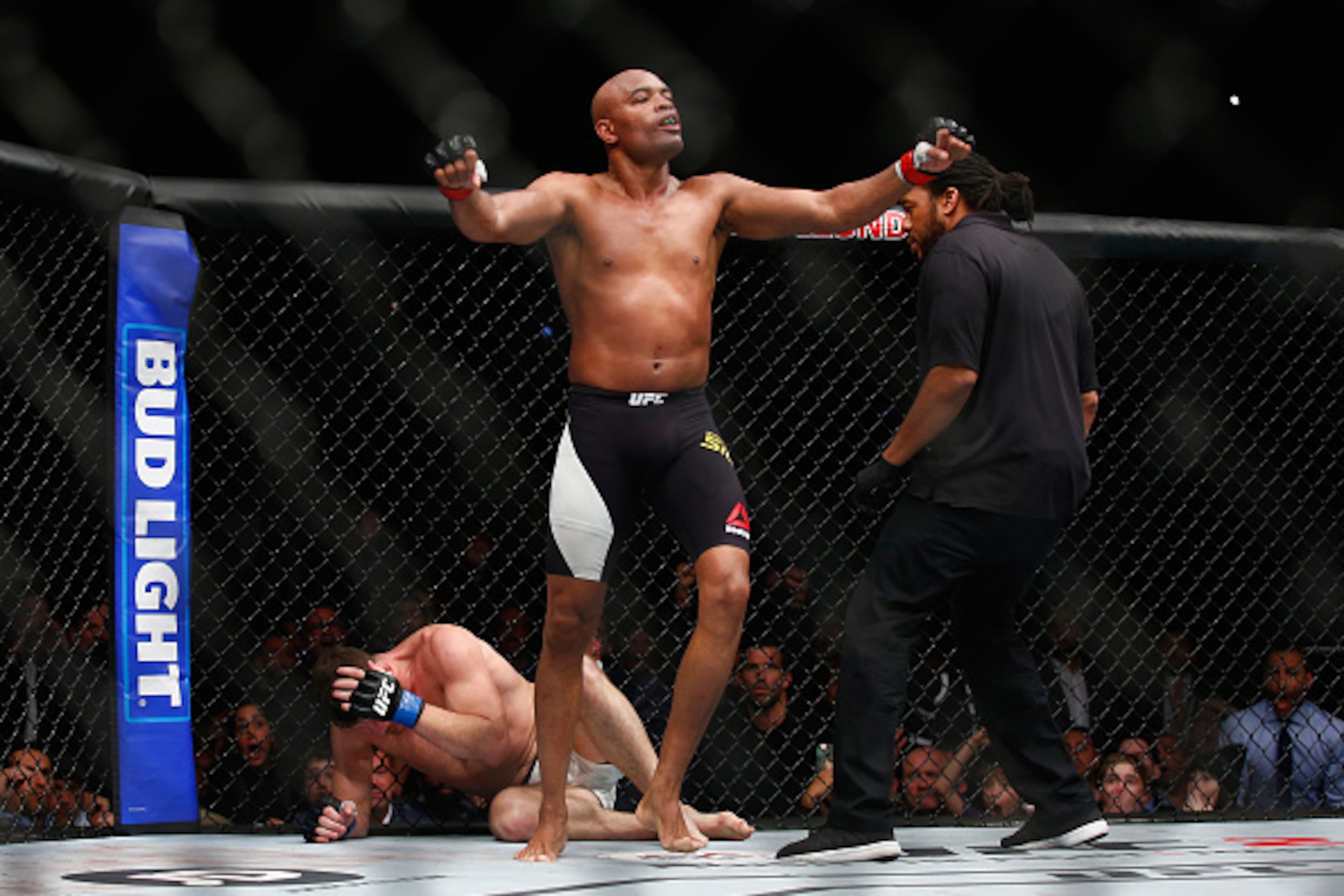 LONDON, ENGLAND - FEBRUARY 27:  Anderson Silva of Brazil starts to celebrate his victory believing that he had knocked out Michael Bisping of Great Britain during the Middleweight Bout of the UFC Fight Night  at The O2 Arena on February 27, 2016 in London