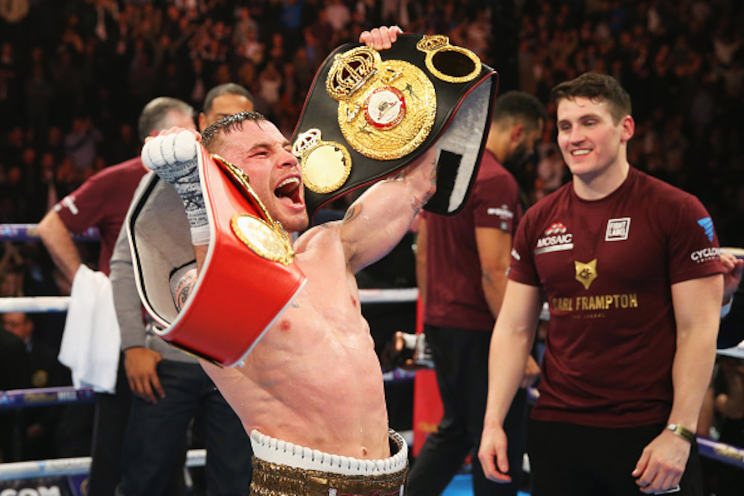 MANCHESTER, ENGLAND - FEBRUARY 27: Carl Frampton celebrates with belts after a points victory over Scott Quigg after their World Super-Bantamweight title contest at Manchester Arena on February 27, 2016 in Manchester, England. Frampton's victory united t MANCHESTER, ENGLAND - FEBRUARY 27: Carl Frampton celebrates with belts after a points victory over Scott Quigg after their World Super-Bantamweight title contest at Manchester Arena on February 27, 2016 in Manchester, England. Frampton's victory united t