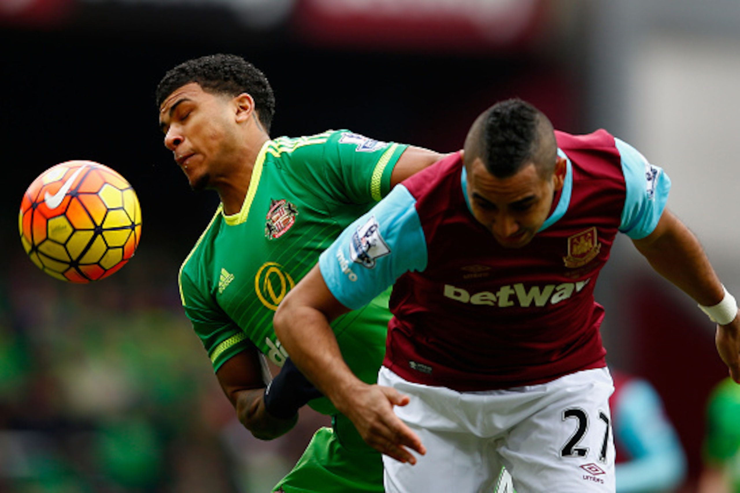 LONDON, ENGLAND - FEBRUARY 27: DeAndre Yedlin of Sunderland and Dimitri Payet of West Ham United compete for the ball during the Barclays Premier League match between West Ham United and Sunderland at Boleyn Ground on February 27, 2016 in London, England.
