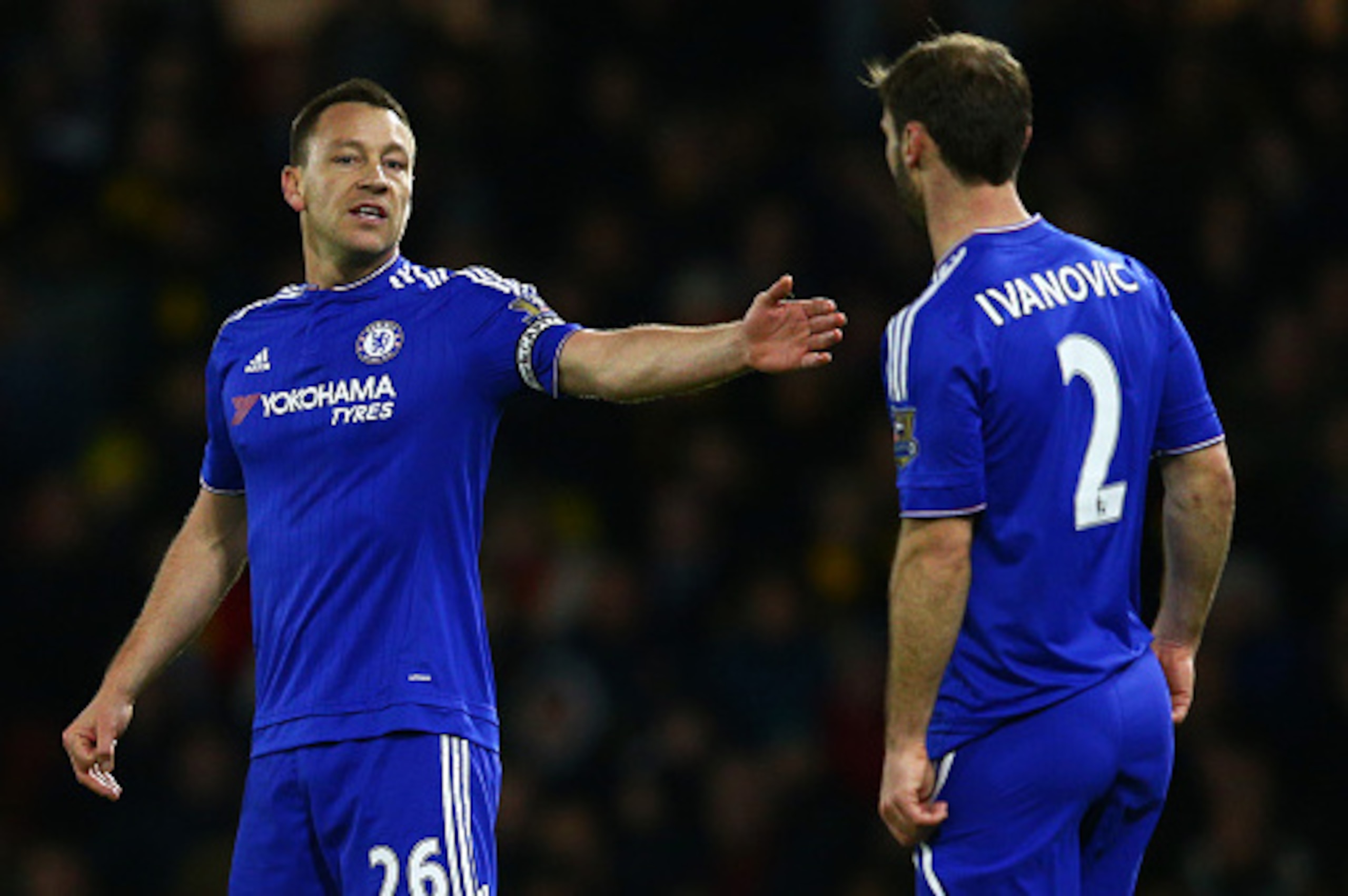 WATFORD, ENGLAND - FEBRUARY 03:  John Terry of Chelsea speaks with Branislav Ivanovic of Chelsea during the Barclays Premier League match between Watford and Chelsea at Vicarage Road on February 3, 2016 in Watford, England.  (Photo by Clive Mason/Getty Im