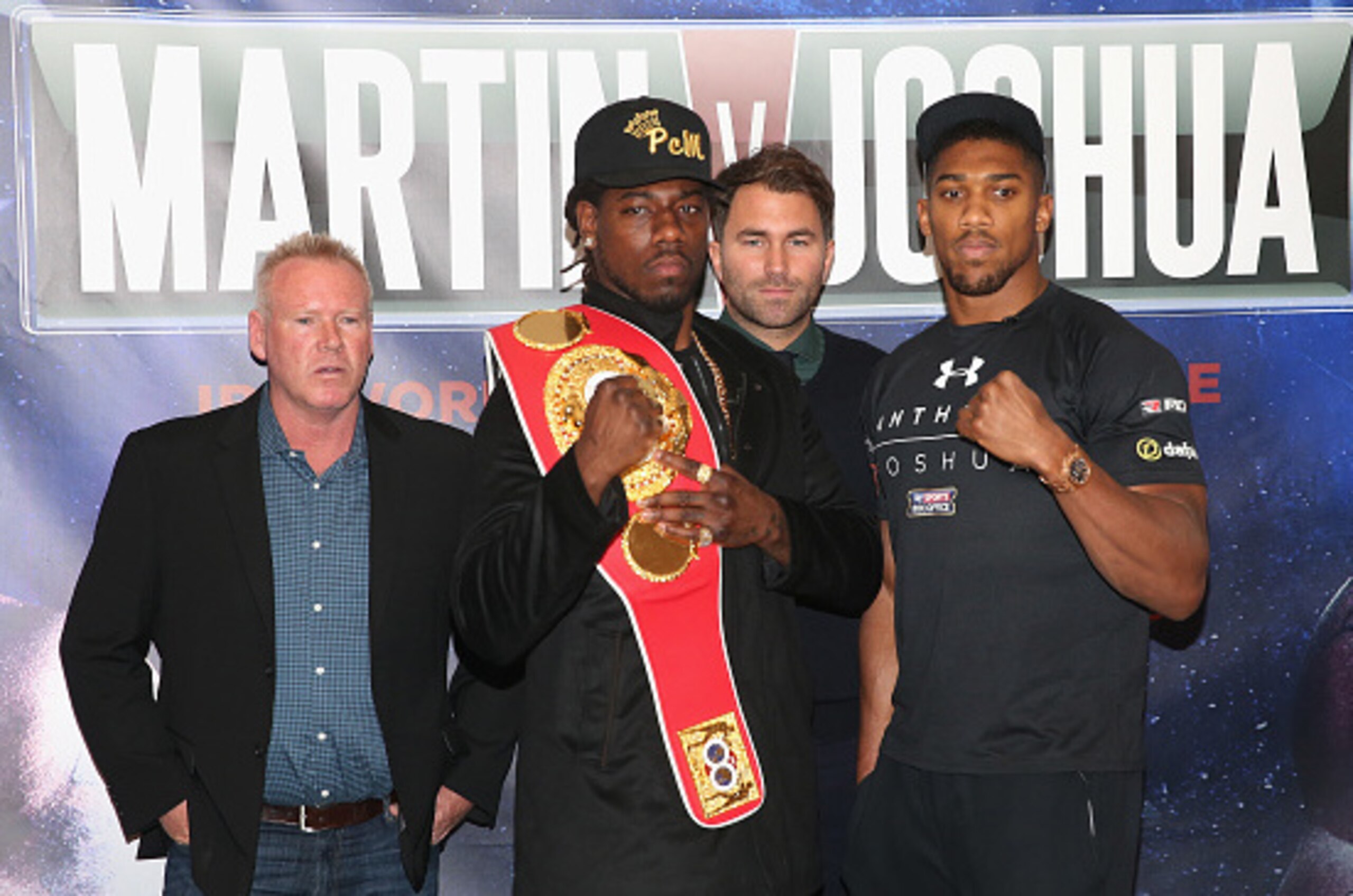 LONDON, ENGLAND - FEBRUARY 19: (L-R) Paul Cain (Martin's trainer), Charles Martin of the USA, promoter Eddie Hearn and Anthony Joshua of England are pictured together during the Anthony Joshua and Charles Martin Press Conference at The Dorchester hotel o LONDON, ENGLAND - FEBRUARY 19: (L-R) Paul Cain (Martin's trainer), Charles Martin of the USA, promoter Eddie Hearn and Anthony Joshua of England are pictured together during the Anthony Joshua and Charles Martin Press Conference at The Dorchester hotel o
