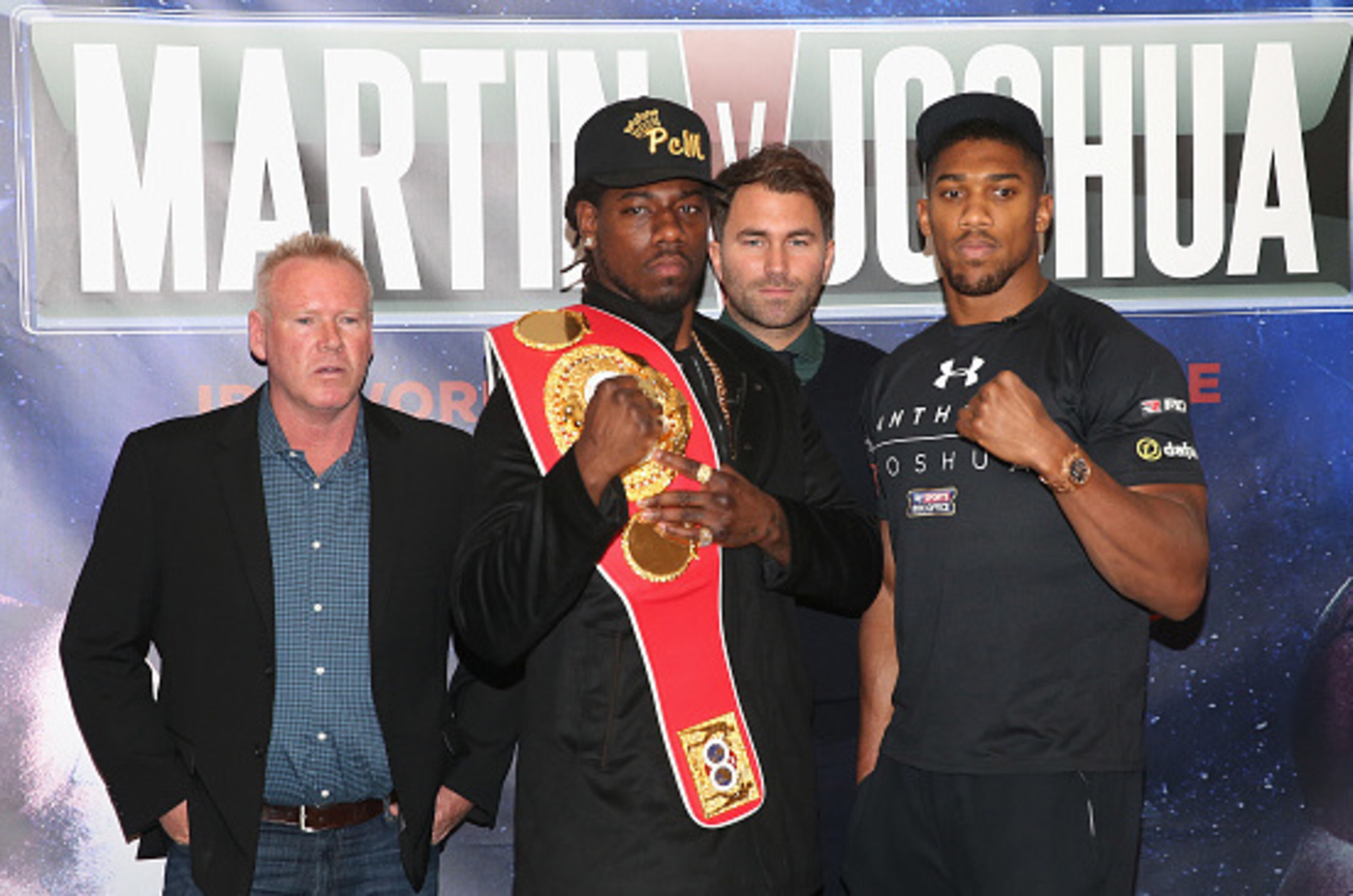 LONDON, ENGLAND - FEBRUARY 19: (L-R) Paul Cain (Martin's trainer), Charles Martin of the USA, promoter Eddie Hearn and Anthony Joshua of England are pictured together during the Anthony Joshua and Charles Martin Press Conference at The Dorchester hotel o LONDON, ENGLAND - FEBRUARY 19: (L-R) Paul Cain (Martin's trainer), Charles Martin of the USA, promoter Eddie Hearn and Anthony Joshua of England are pictured together during the Anthony Joshua and Charles Martin Press Conference at The Dorchester hotel o