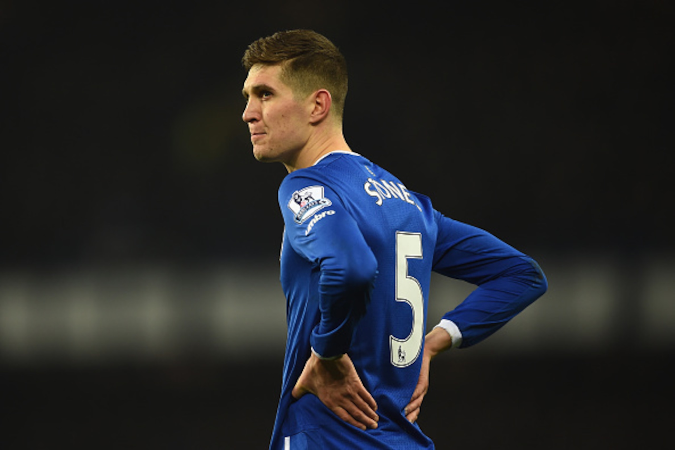 LIVERPOOL, ENGLAND - JANUARY 06:  John Stones of Everton looks on during the Capital One Cup Semi Final First Leg match between Everton and Manchester City at Goodison Park on January 6, 2016 in Liverpool, England.  (Photo by Laurence Griffiths/Getty Imag
