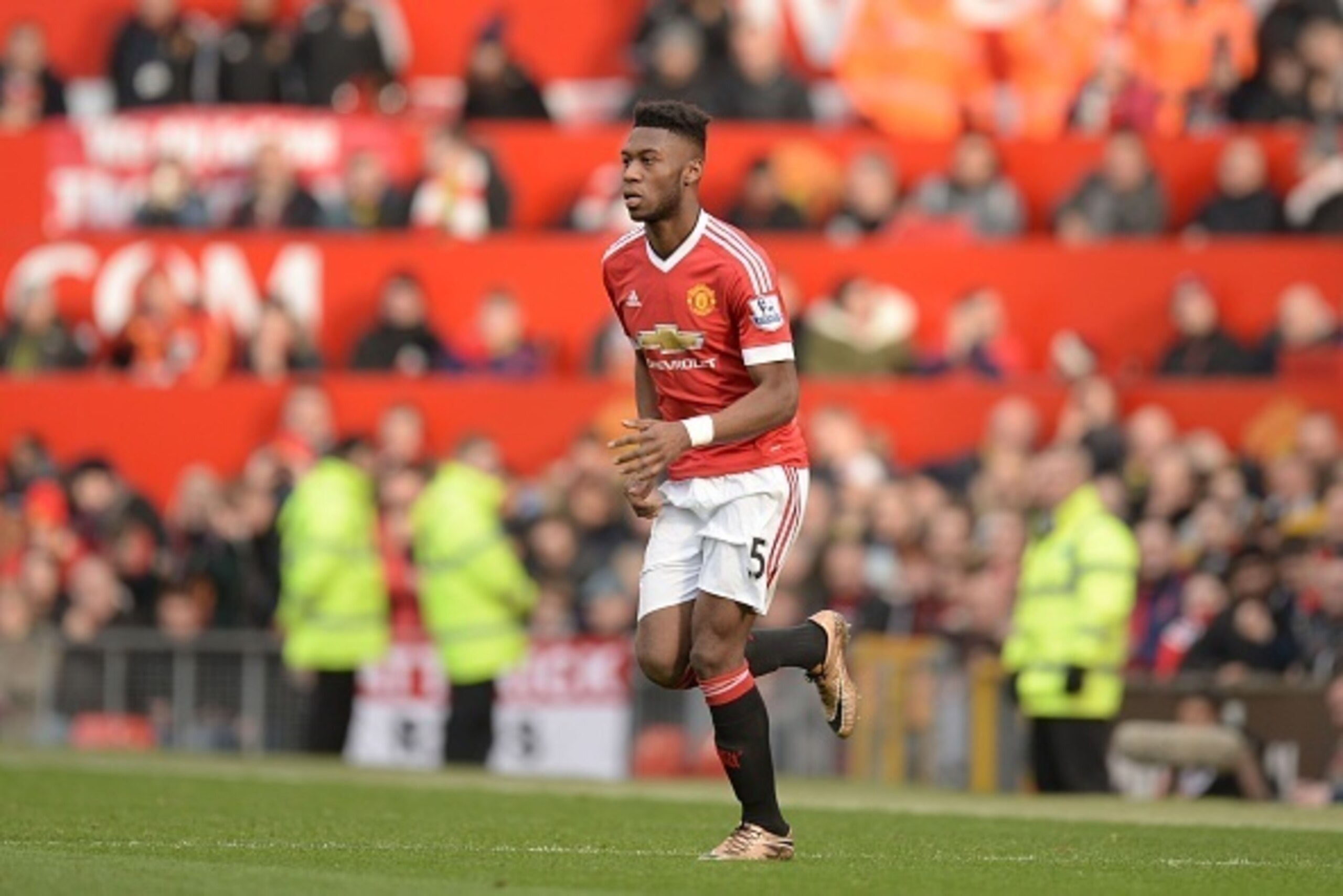 Manchester United's Dutch defender Timothy Fosu-Mensah comes on for his senior debut during the English Premier League football match between Manchester United and Arsenal at Old Trafford in Manchester in north west England on February 28, 2016. / AFP / O Manchester United's Dutch defender Timothy Fosu-Mensah comes on for his senior debut during the English Premier League football match between Manchester United and Arsenal at Old Trafford in Manchester in north west England on February 28, 2016. / AFP / O