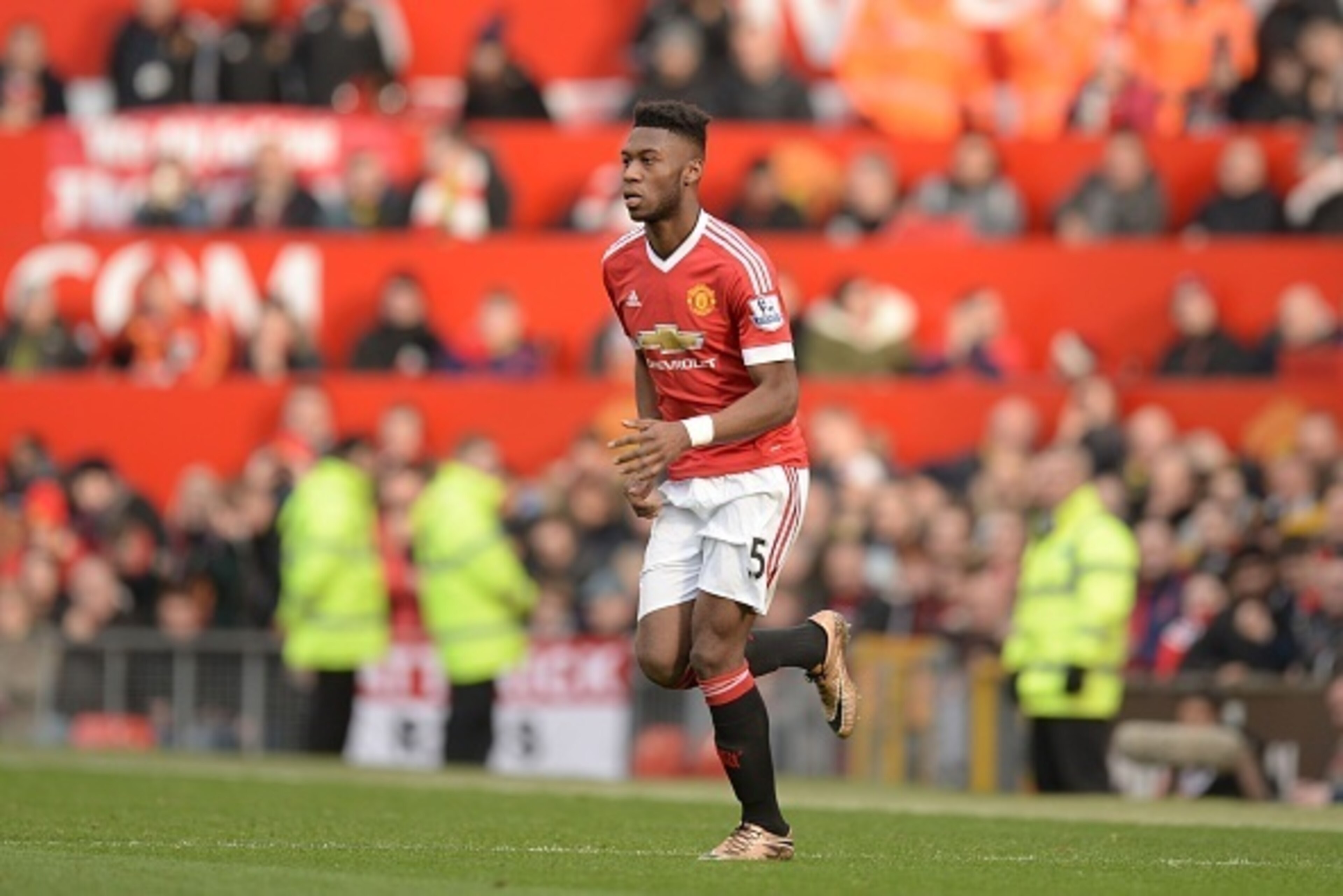 Manchester United's Dutch defender Timothy Fosu-Mensah comes on for his senior debut during the English Premier League football match between Manchester United and Arsenal at Old Trafford in Manchester in north west England on February 28, 2016. / AFP / O