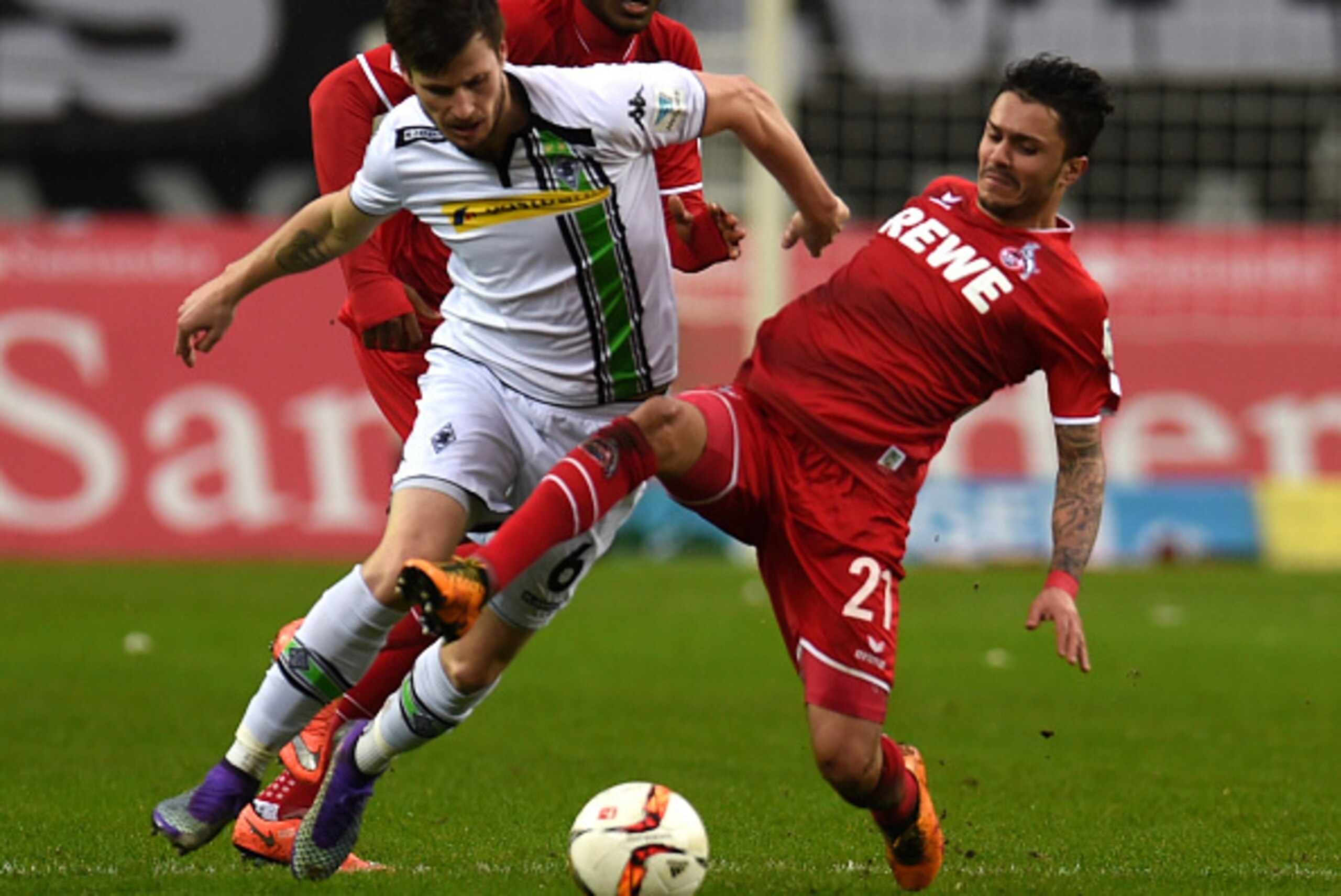 Cologne's midfielder Leonardo Bittencourt (R) and Moenchengladbach's Norwegian midfielder Havard Nordtveit vie for the ball during the German first division Bundesliga football match Borussia Moenchengladbach vs 1. FC Cologne in Moenchengladbach , western