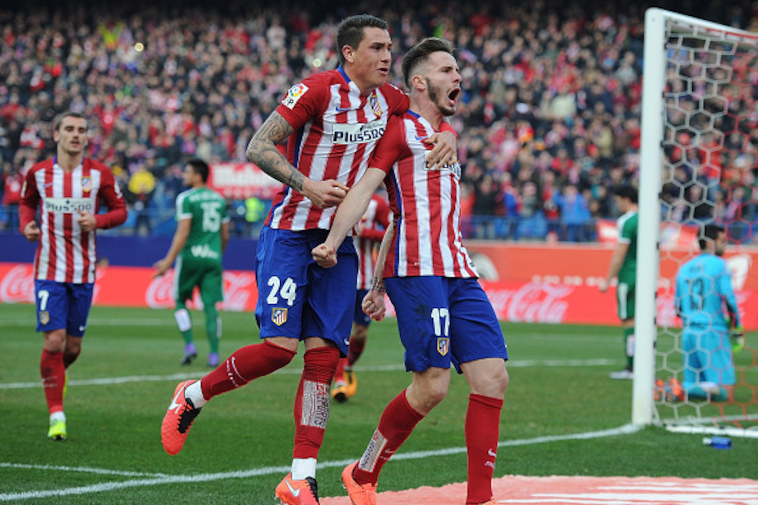MADRID, SPAIN - FEBRUARY 06:  Saul Niguez (R) of Club Atletico de Madrid celebrates with  Jose Maria Gimenez after scoring his team's 2nd goal during the La Liga match between Club Atletico de Madrid and SD Eibar at Vicente Calderon Stadium on February 6,