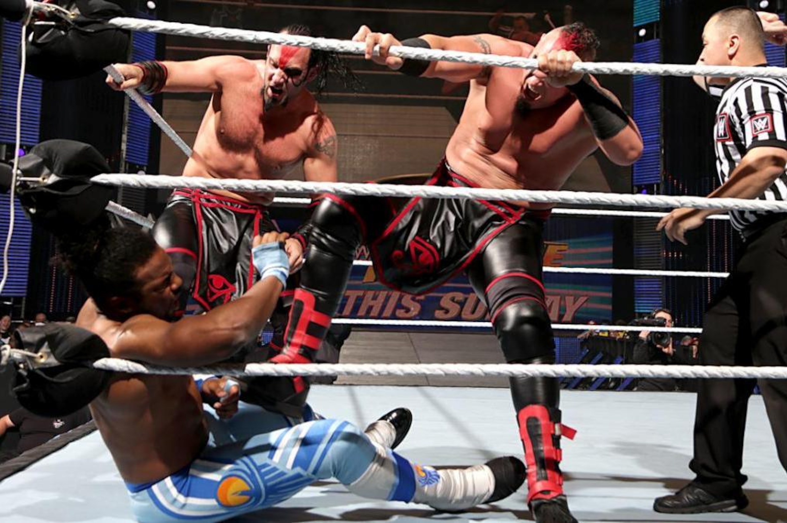 The Ascension work in unison against Xavier Woods.
