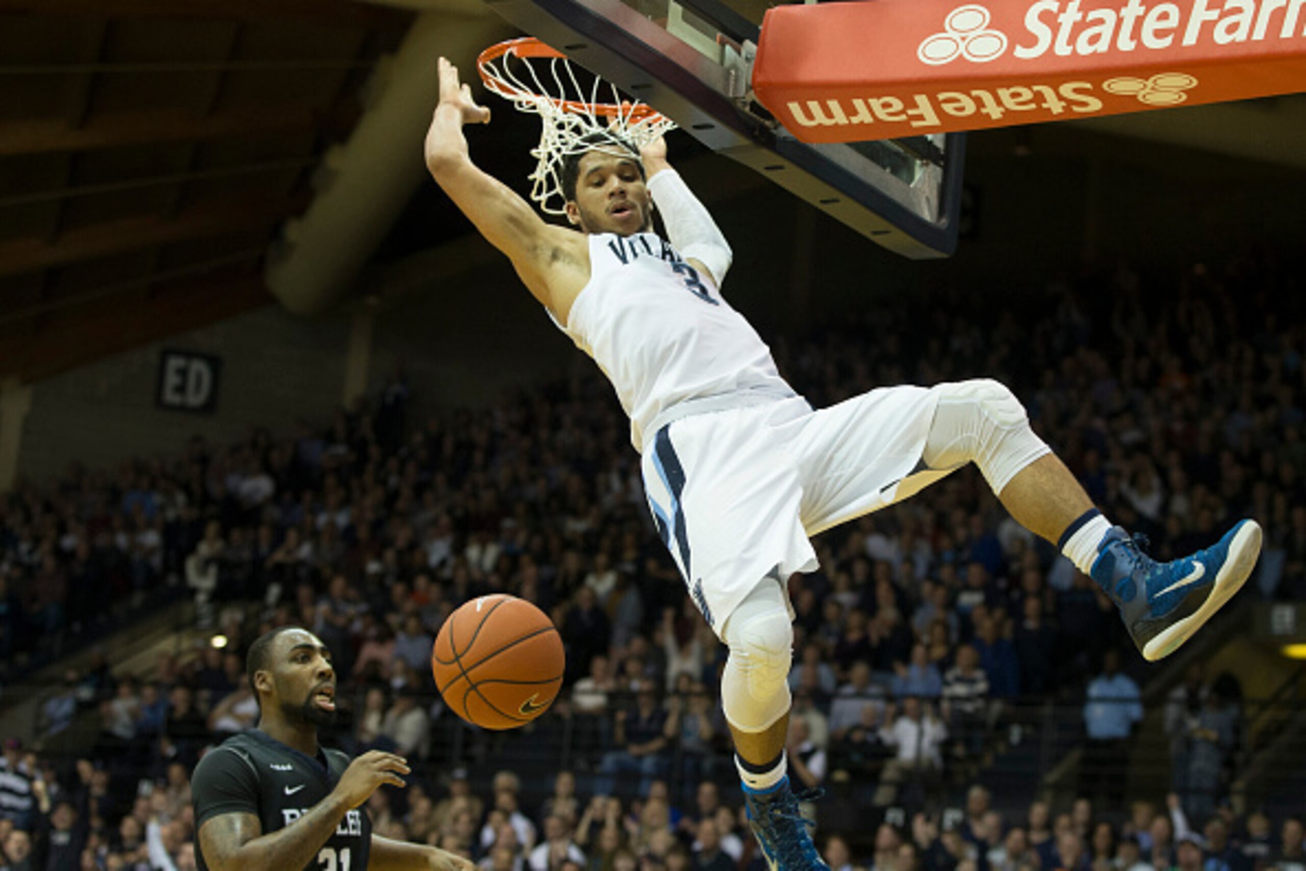 VILLANOVA, PA - FEBRUARY 20: Josh Hart #3 of the Villanova Wildcats dunks the ball against Roosevelt Jones #21 of the Butler Bulldogs on February 20, 2016 at the Pavilion in Villanova, Pennsylvania. (Photo by Mitchell Leff/Getty Images)