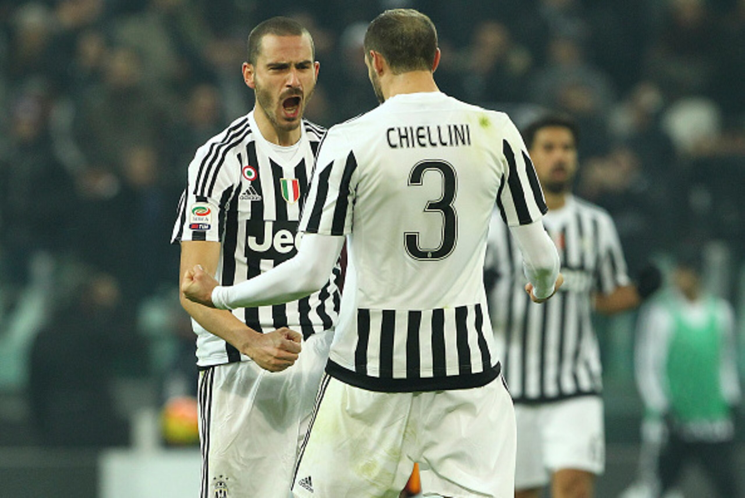 TURIN, ITALY - JANUARY 24:  Leonardo Bonucci and Giorgio Chiellini of Juventus FC celebrate a victory at the end of the Serie A match between Juventus FC and AS Roma at Juventus Arena on January 24, 2016 in Turin, Italy.  (Photo by Marco Luzzani/Getty Ima
