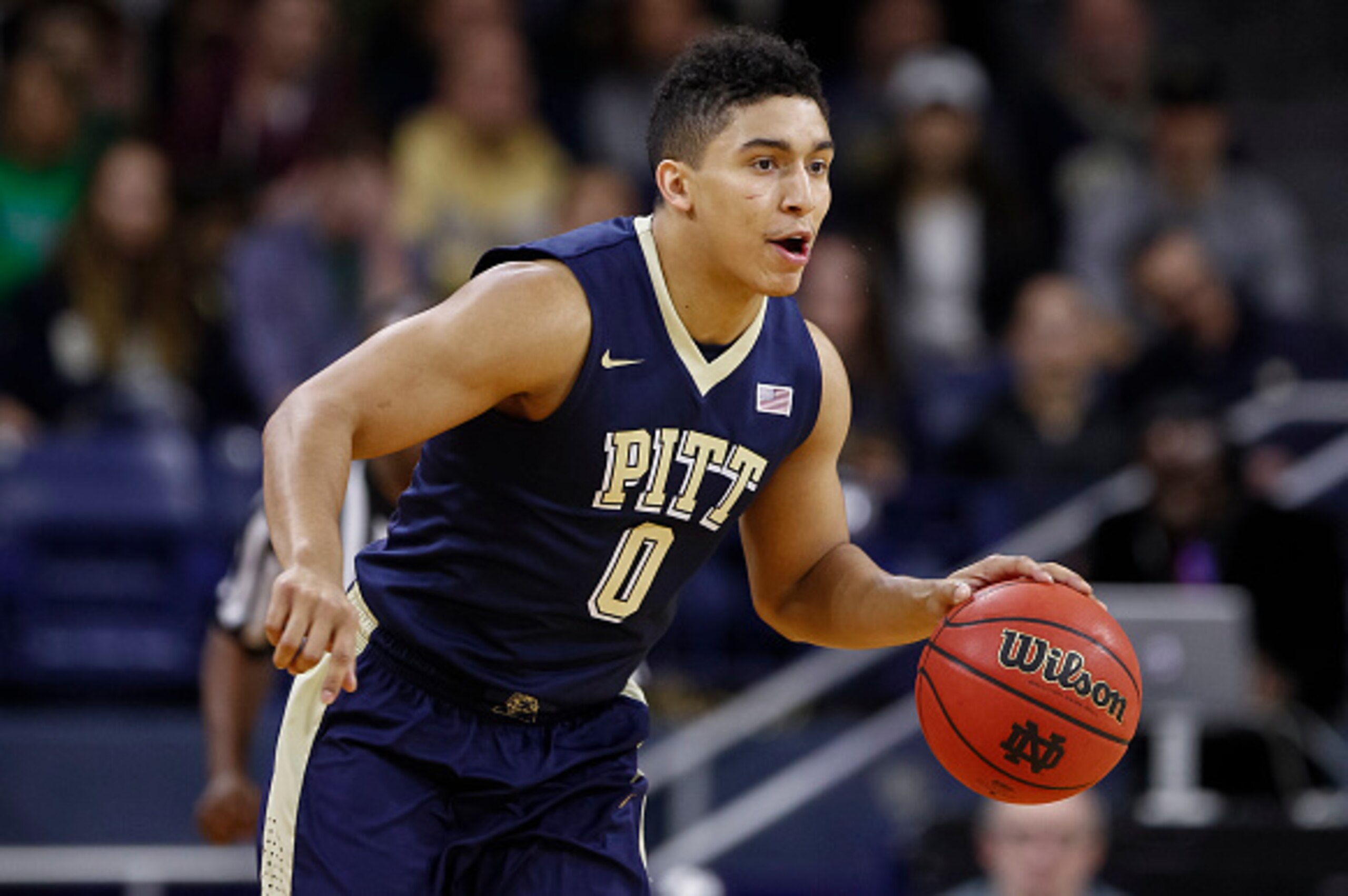 SOUTH BEND, IN - JANUARY 9: James Robinson #0 of the Pittsburgh Panthers brings the ball up court during the game against the Notre Dame Fighting Irish at Purcell Pavilion on January 9, 2016 in South Bend, Indiana.  (Photo by Michael Hickey/Getty Images)