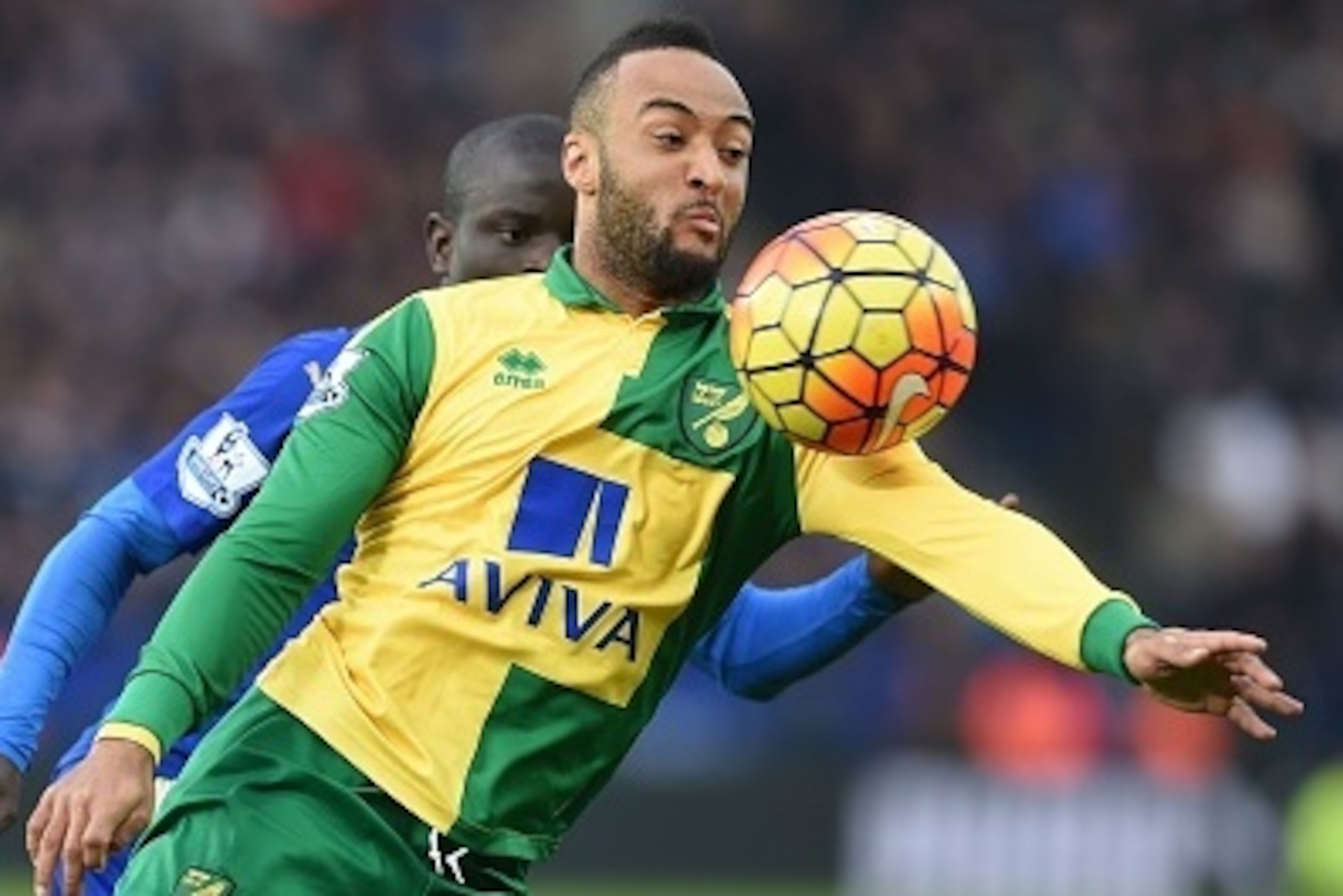 Norwich City's English midfielder Nathan Redmond (R) vies with Leicester City's French midfielder N'Golo Kante during the English Premier League football match between Leicester City and Norwich City at King Power Stadium in Leicester, central England on 