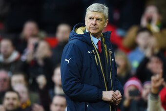 MANCHESTER, ENGLAND - FEBRUARY 28:  Arsene Wenger, Manager of Arsenal walks back to the dressing room after the Barclays Premier League match between Manchester United and Arsenal at Old Trafford on February 28, 2016 in Manchester, England.  (Photo by Sha