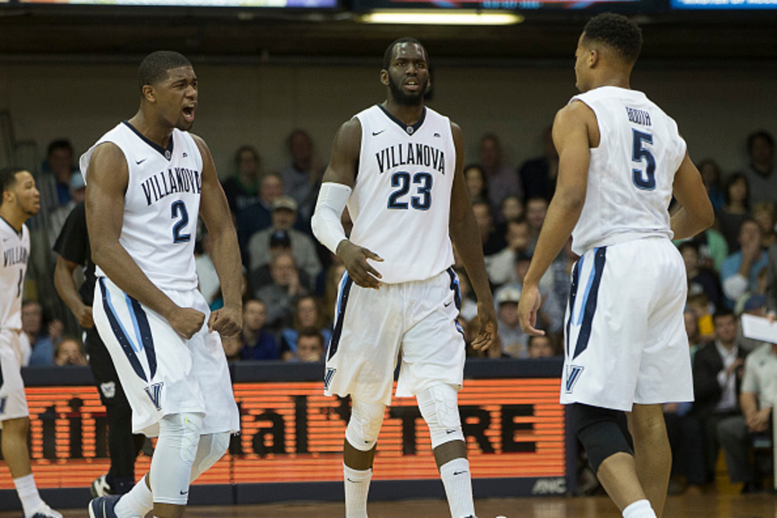 VILLANOVA, PA - FEBRUARY 20: Kris Jenkins #2, Daniel Ochefu #23, and Phil Booth #5 of the Villanova Wildcats react in the game against the Butler Bulldogs on February 20, 2016 at the Pavilion in Villanova, Pennsylvania. (Photo by Mitchell Leff/Getty Image