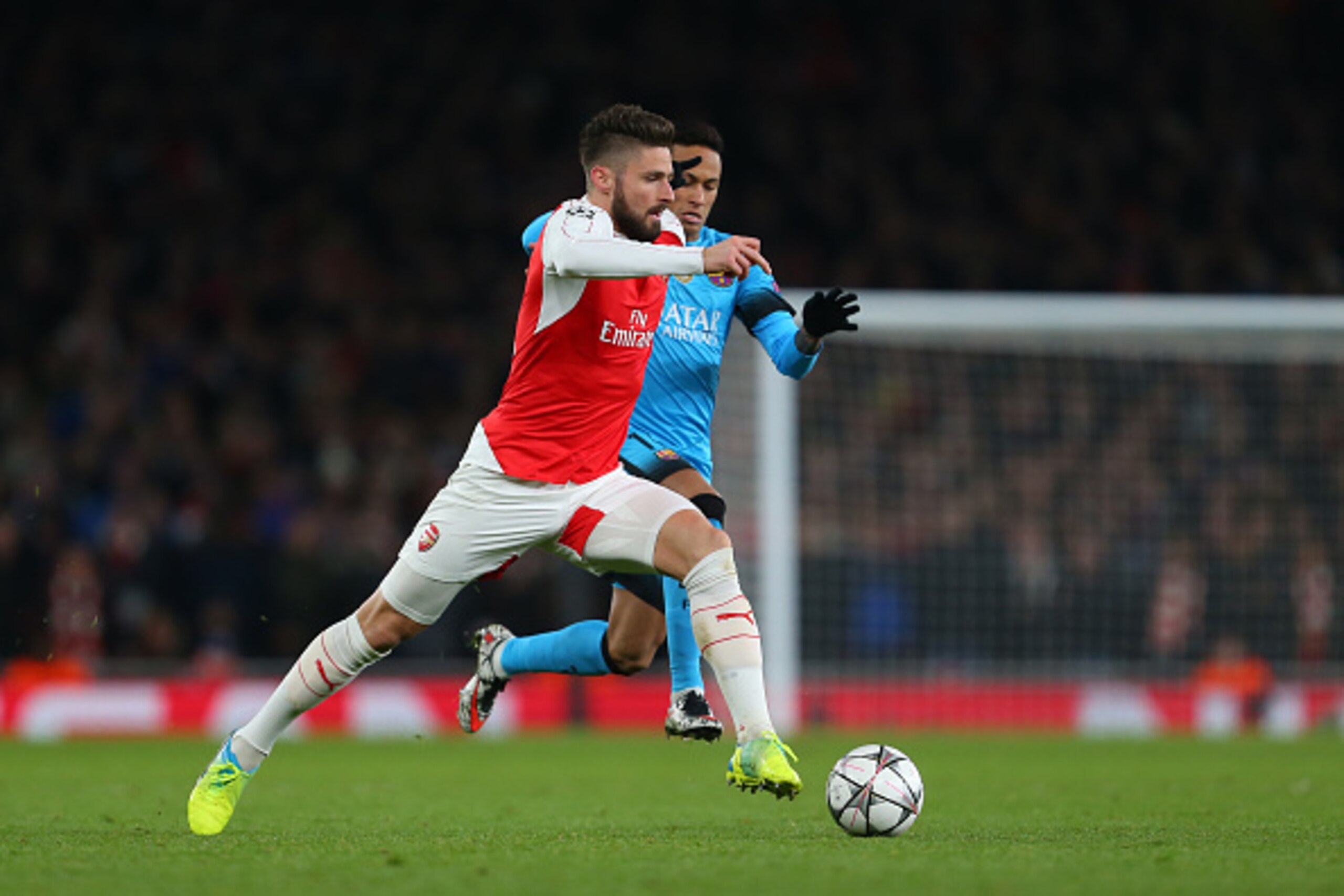 LONDON, ENGLAND - FEBRUARY 23 :  Olivier Giroud of Arsenal and Neymar of FC Barcelona during the UEFA Champions League match between Arsenal and Barcelona at the Emirates Stadium on February 23, 2016 in London, United Kingdom.  (Photo by Catherine Ivill -
