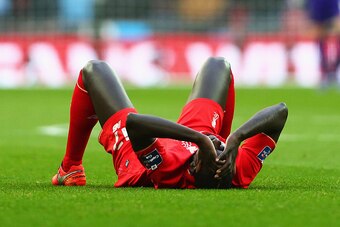 LONDON, ENGLAND - FEBRUARY 28:  Mamadou Sakho of Liverpool is injured during the Capital One Cup Final match between Liverpool and Manchester City at Wembley Stadium on February 28, 2016 in London, England.  (Photo by Clive Brunskill/Getty Images)