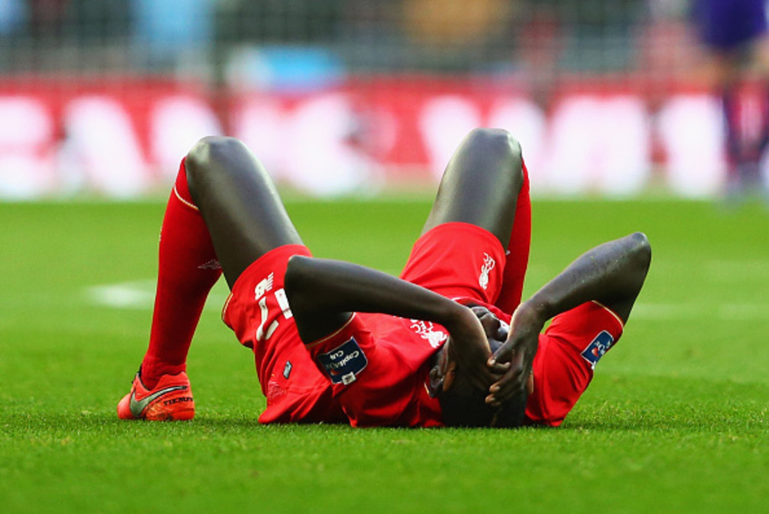 LONDON, ENGLAND - FEBRUARY 28:  Mamadou Sakho of Liverpool is injured during the Capital One Cup Final match between Liverpool and Manchester City at Wembley Stadium on February 28, 2016 in London, England.  (Photo by Clive Brunskill/Getty Images)