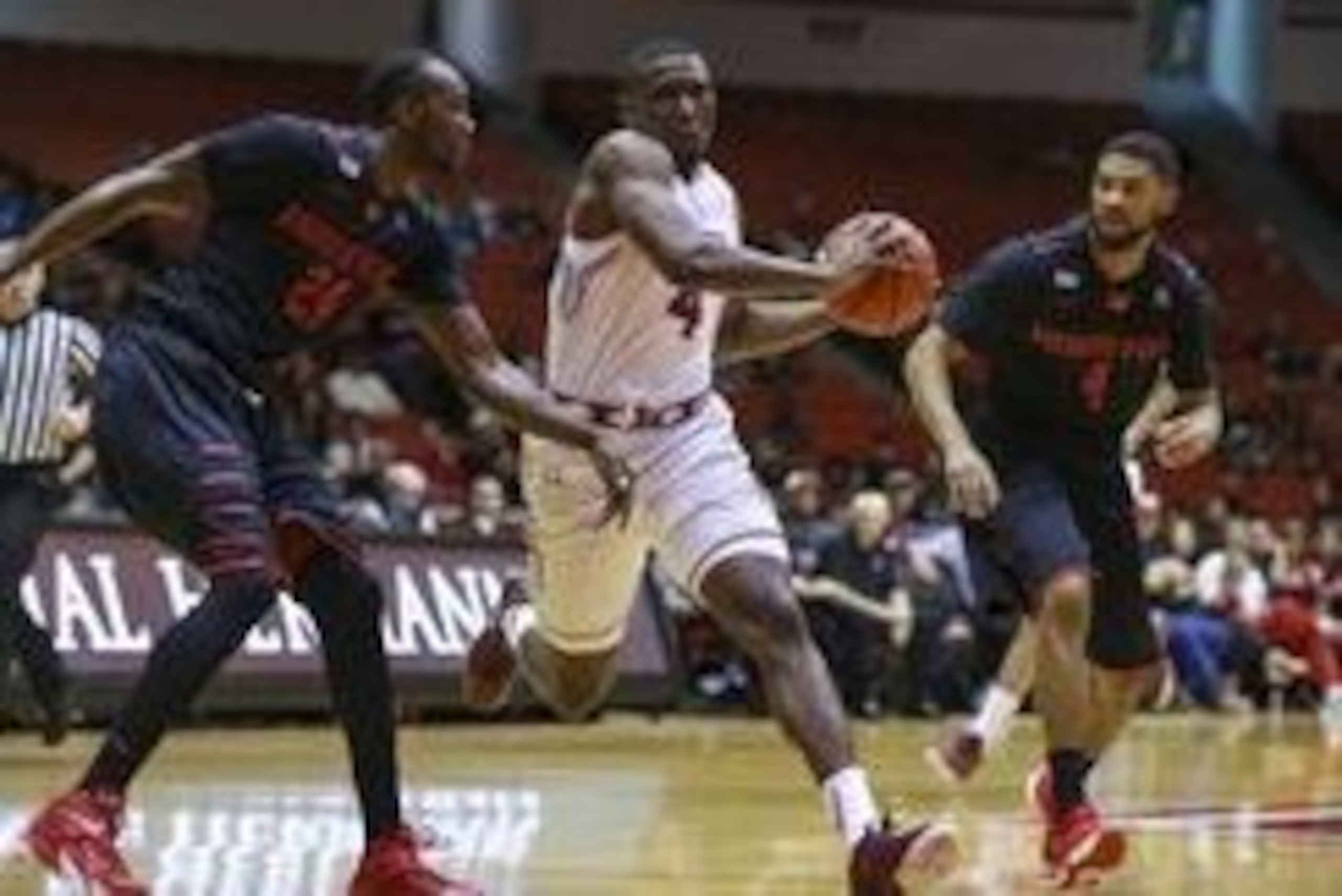 Feb 21, 2016; Houston, TX, USA; Temple Owls guard Daniel Dingle (4) drives with the ball as Houston Cougars forward Devonta Pollard (24) defends during the first half at Hofheinz Pavilion. Mandatory Credit: Troy Taormina-USA TODAY Sports