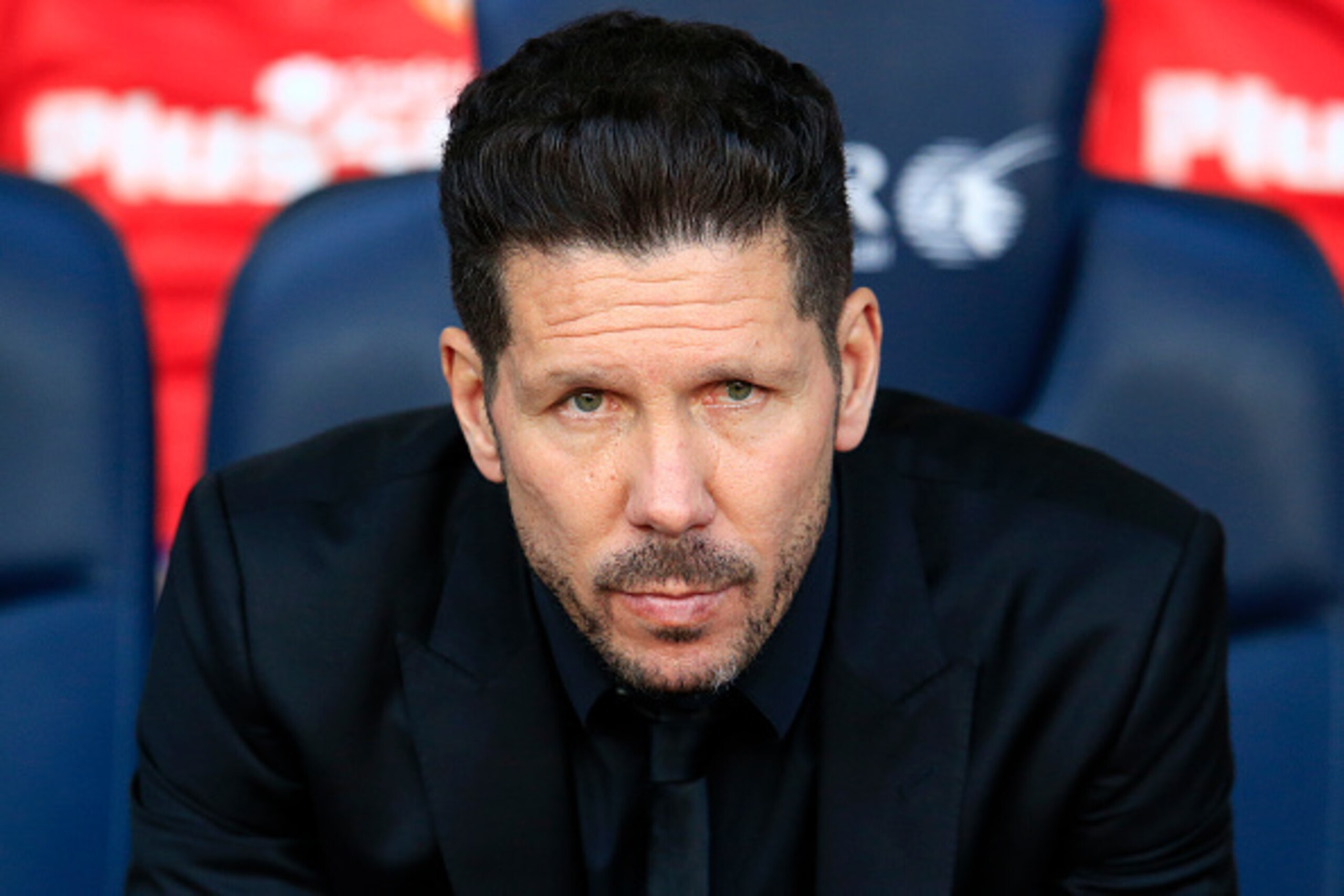 Atletico Madrid's Argentinian coach Diego Simeone looks on before the Spanish league football match FC Barcelona vs Club Atletico de Madrid at the Camp Nou stadium in Barcelona on January 30, 2016. AFP PHOTO/ PAU BARRENA / AFP / PAU BARRENA (Phot Atletico Madrid's Argentinian coach Diego Simeone looks on before the Spanish league football match FC Barcelona vs Club Atletico de Madrid at the Camp Nou stadium in Barcelona on January 30, 2016. AFP PHOTO/ PAU BARRENA / AFP / PAU BARRENA (Phot