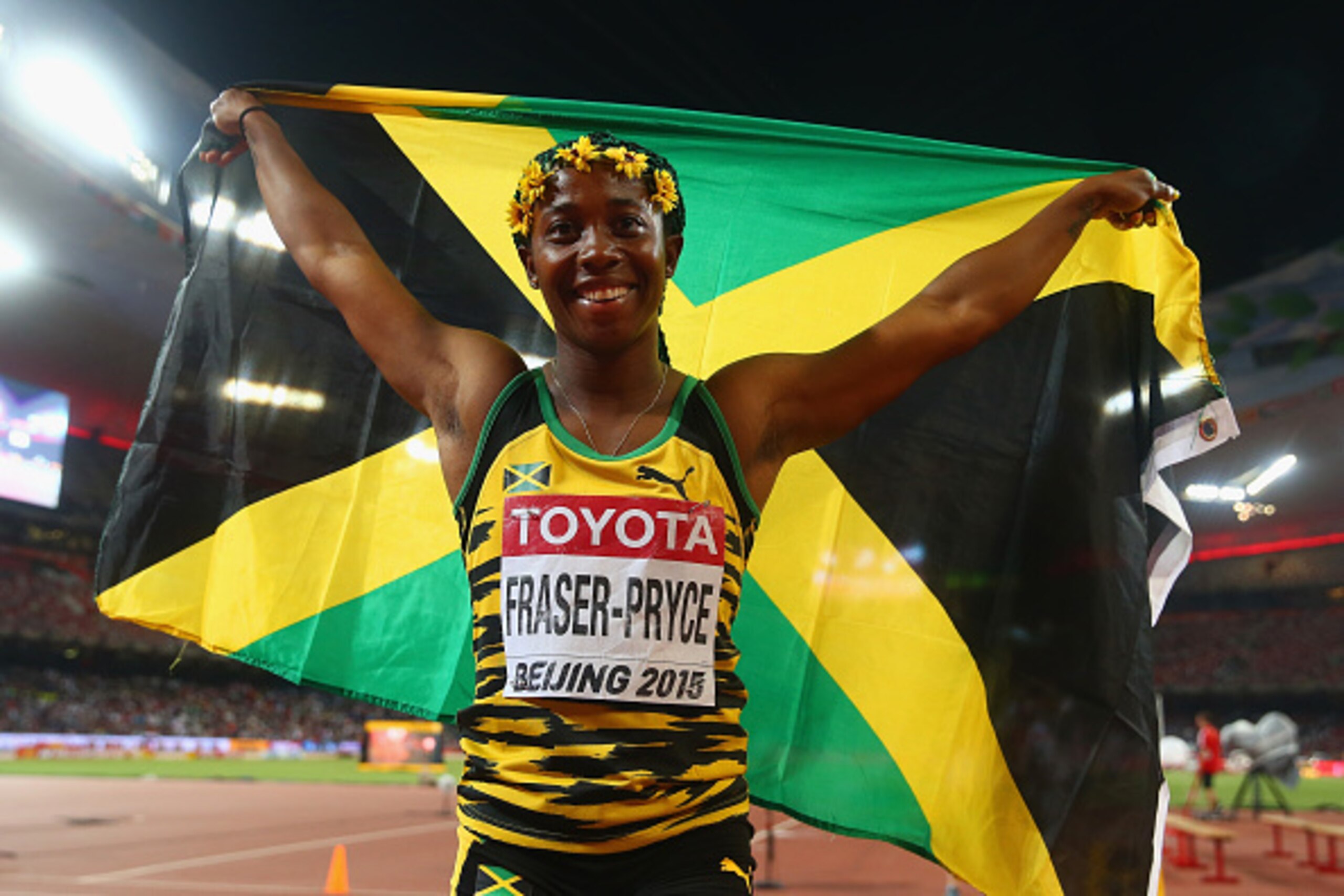 BEIJING, CHINA - AUGUST 29:  Shelly-Ann Fraser-Pryce of Jamaica celebrates after crossing the finish line to win gold in the Women's 4x100 Metres Relay final during day eight of the 15th IAAF World Athletics Championships Beijing 2015 at Beijing National 