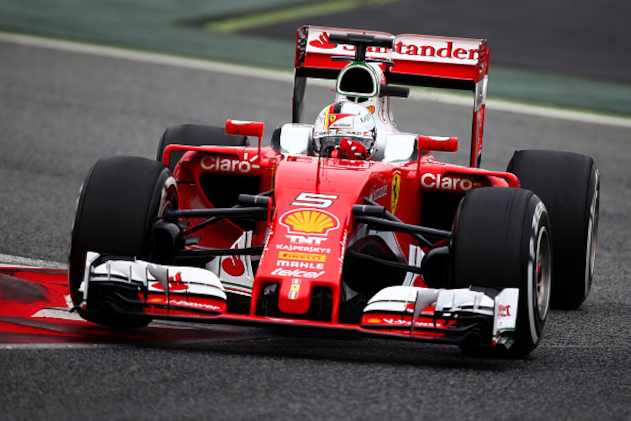 MONTMELO, SPAIN - MARCH 02: Sebastian Vettel of Germany and Ferrari drives during day two of F1 winter testing at Circuit de Catalunya on March 2, 2016 in Montmelo, Spain. (Photo by Dan Istitene/Getty Images) MONTMELO, SPAIN - MARCH 02: Sebastian Vettel of Germany and Ferrari drives during day two of F1 winter testing at Circuit de Catalunya on March 2, 2016 in Montmelo, Spain. (Photo by Dan Istitene/Getty Images)