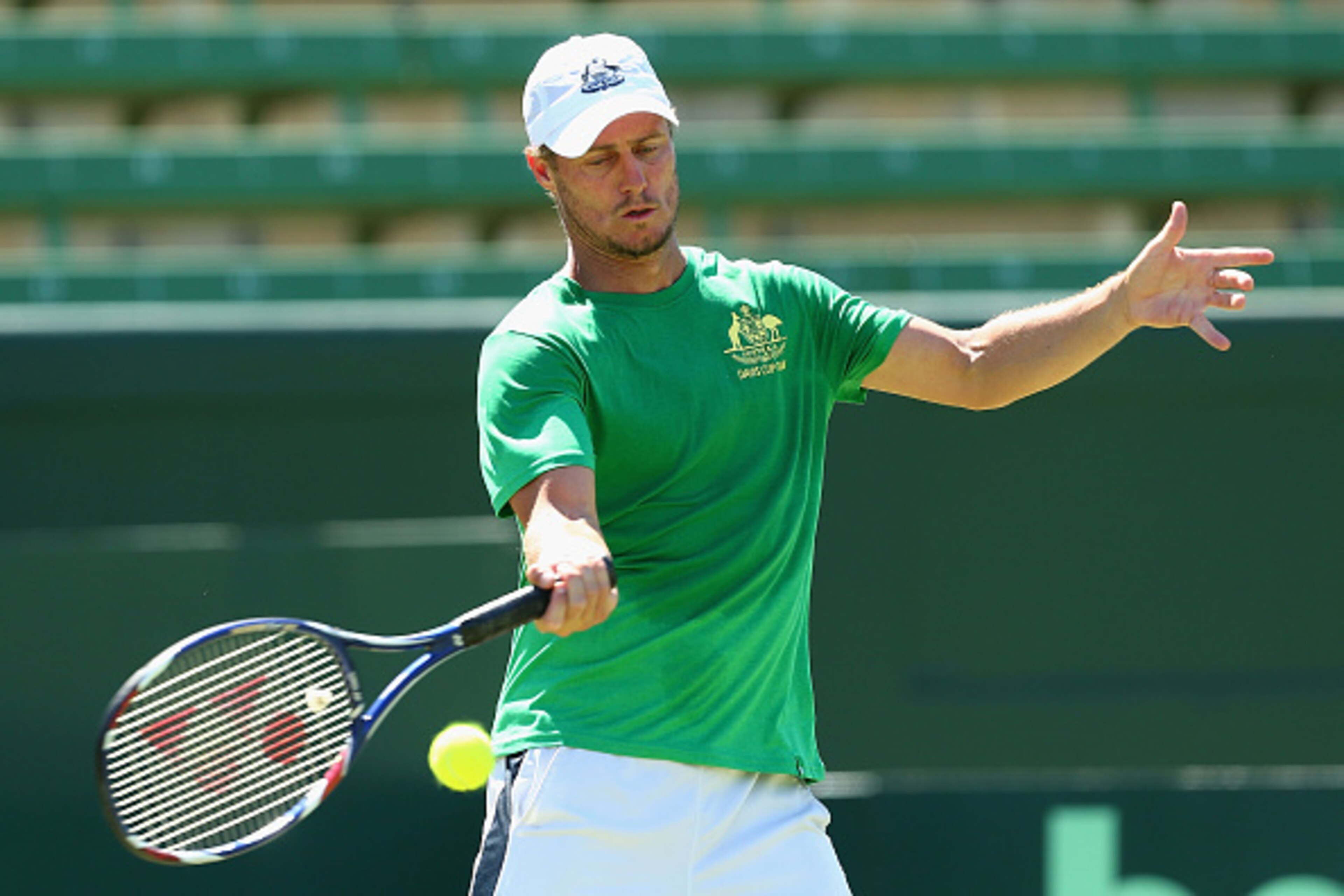 MELBOURNE, AUSTRALIA - MARCH 02:  Lleyton Hewitt captain of Australia plays a forehand during a practice session ahead of the Davis Cup Tie between Australia and the United States at Kooyong on March 2, 2016 in Melbourne, Australia.  (Photo by Robert Prez