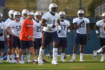 Auburn DC Kevin Steele (left) and DT Montravius Adams (center)