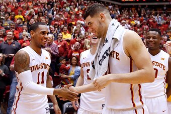 AMES, IA - FEBRUARY 29: Georges Niang #31 of the Iowa State Cyclones shakes hands with teammate Monte Morris #11 of the Iowa State Cyclones after defeating the Oklahoma State Cowboys 58-50 at Hilton Coliseum on February 29, 2016 in Ames, Iowa.  (Photo by 