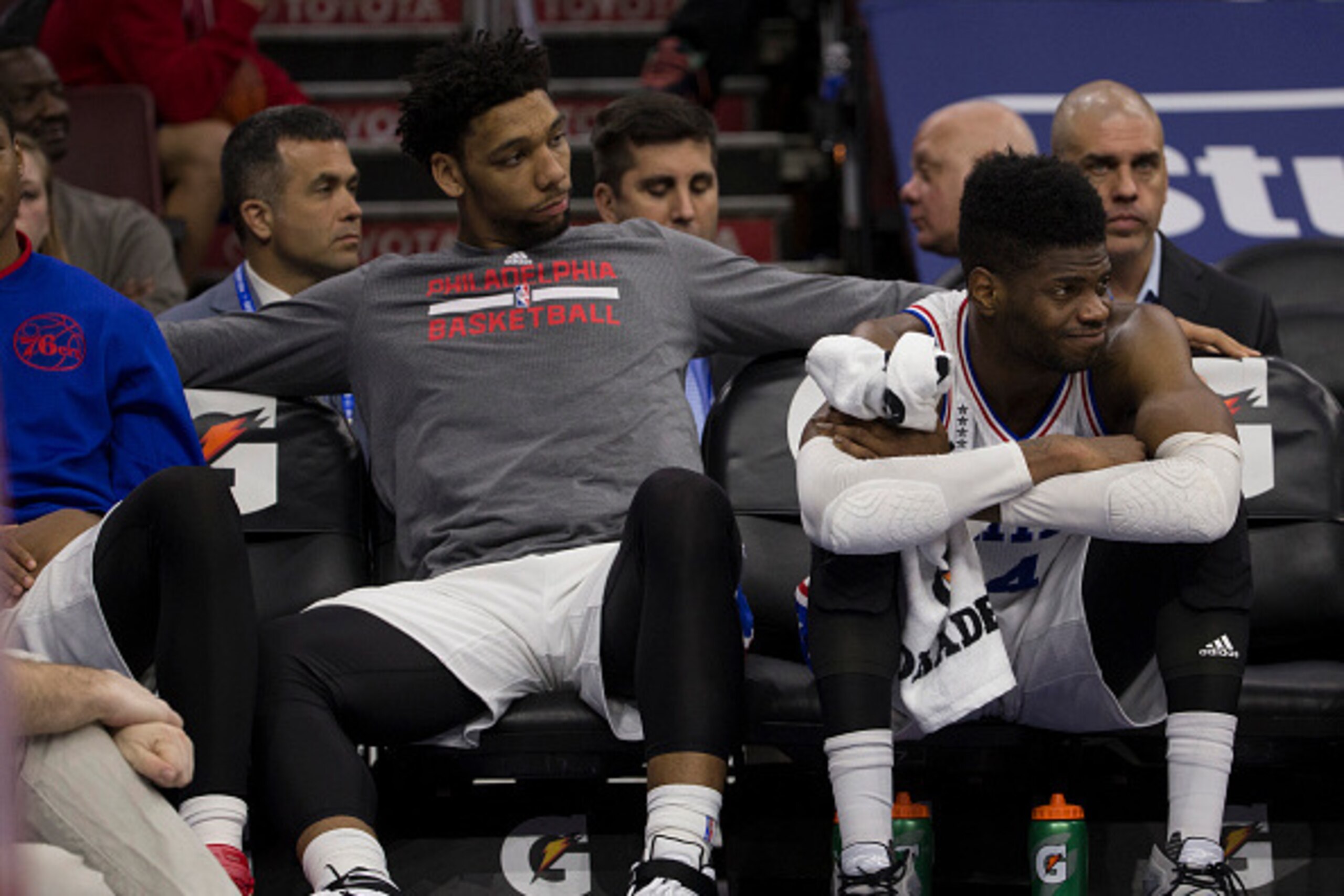 PHILADELPHIA, PA - FEBRUARY 23: Jahlil Okafor #8 and Nerlens Noel #4 of the Philadelphia 76ers watch the game against the Orlando Magic from the bench on February 23, 2016 at the Wells Fargo Center in Philadelphia, Pennsylvania. The Magic defeated the 76e