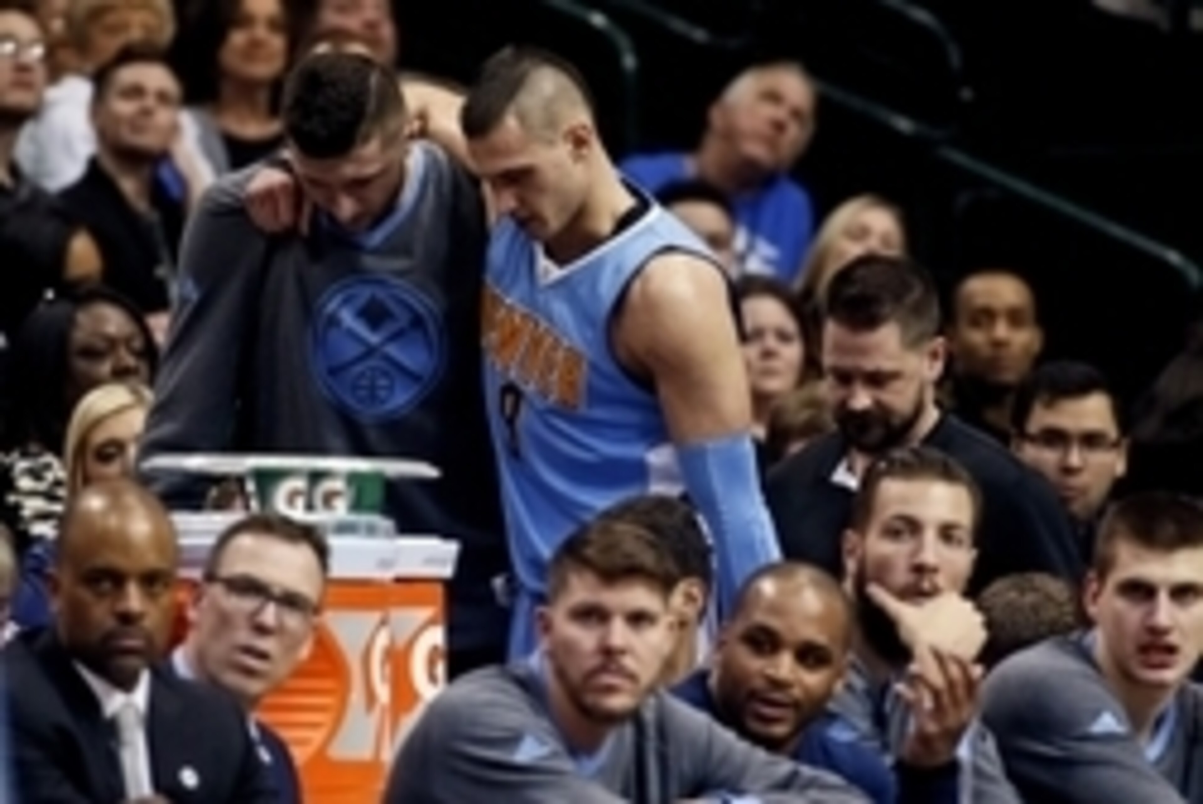 Feb 26, 2016; Dallas, TX, USA; Denver Nuggets forward Danilo Gallinari (8) is helped into the locker room after getting injured during the game against the Dallas Mavericks at American Airlines Center. Mandatory Credit: Kevin Jairaj-USA TODAY Sports