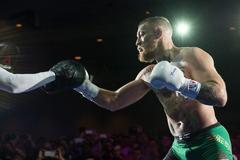 LAS VEGAS, NV - MARCH 2:   UFC featherweight champion Conor McGregor holds an open training session for fans and media at the  Jabbawockeez Theater in the MGM Grand Hotel/Casino on March 2, 2016 in Las Vegas, Nevada. (Photo by Brandon Magnus/Zuffa LLC/Zuf