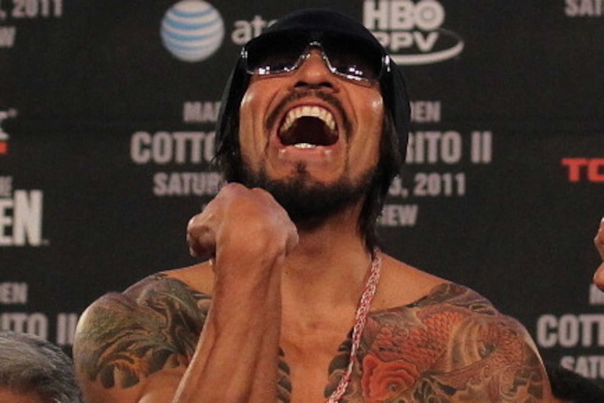 NEW YORK, NY - DECEMBER 02:  Antonio Margarito of Mexico gestures as he takes the scale for his bout with Miguel Cotto of Puerto Rico during their weigh in at The Theater at Madison Square Garden on December 2, 2011 in New York City.  (Photo by Nick Laham