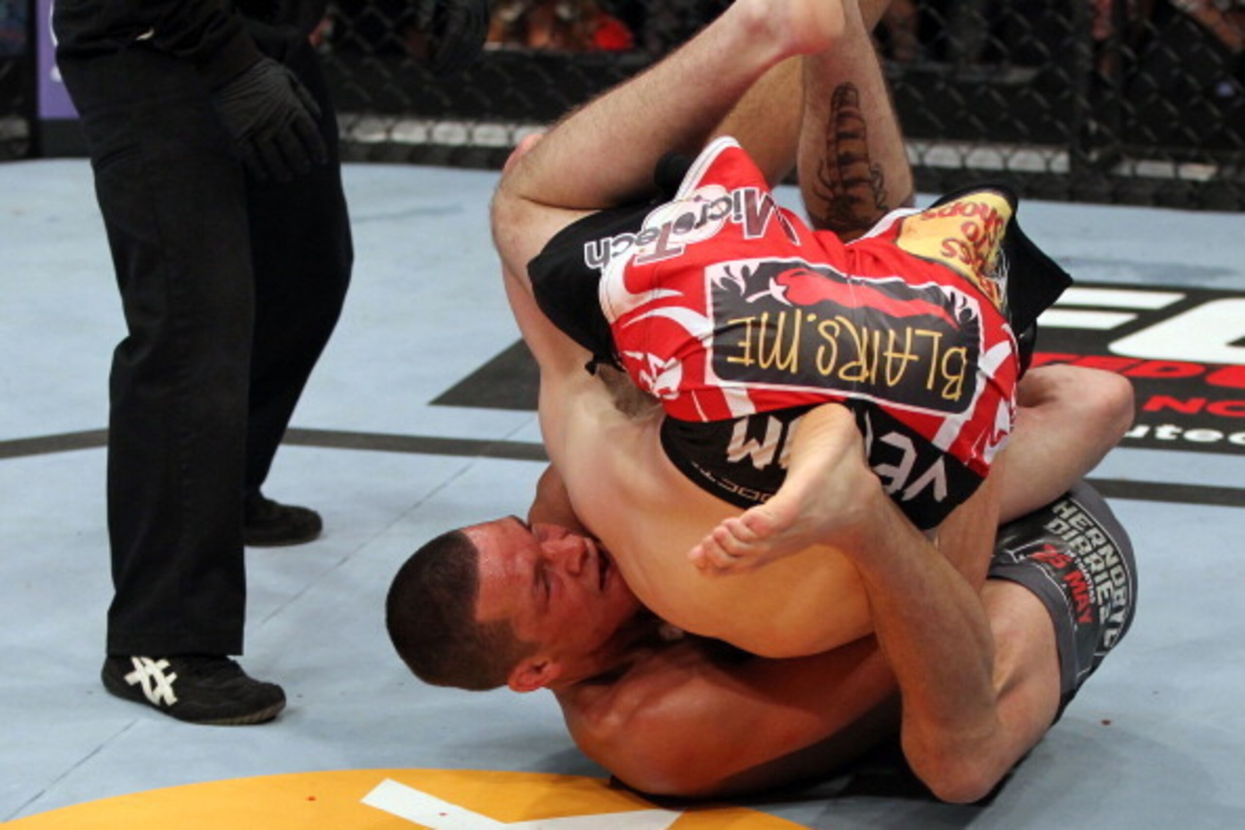 EAST RUTHERFORD, NJ - MAY 05:  Nate Diaz Takes down Jim Miller during their Lightweight bout at Izod Center on May 5, 2012 in East Rutherford, New Jersey.  (Photo by Josh Hedges/Zuffa LLC/Zuffa LLC via Getty Images)