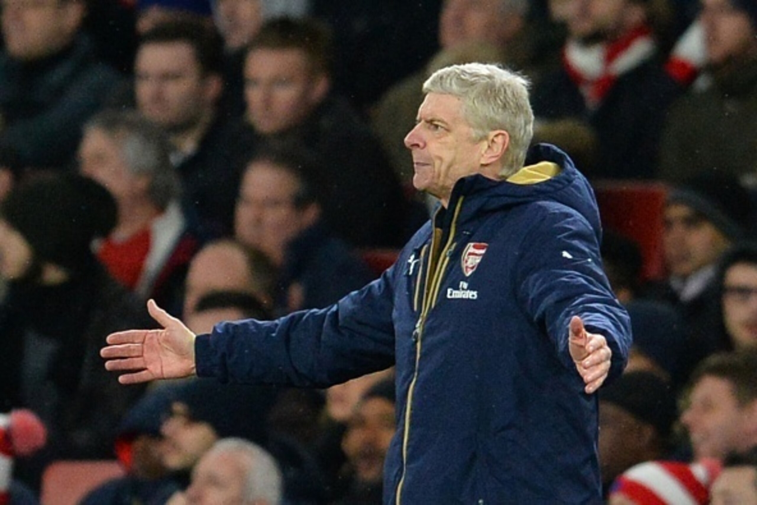 Arsenal's French manager Arsene Wenger reacts on the touchline during the English Premier League football match between Arsenal and Swansea City at the Emirates Stadium in London on March 2, 2016.  / AFP / GLYN KIRK / RESTRICTED TO EDITORIAL USE. No use w