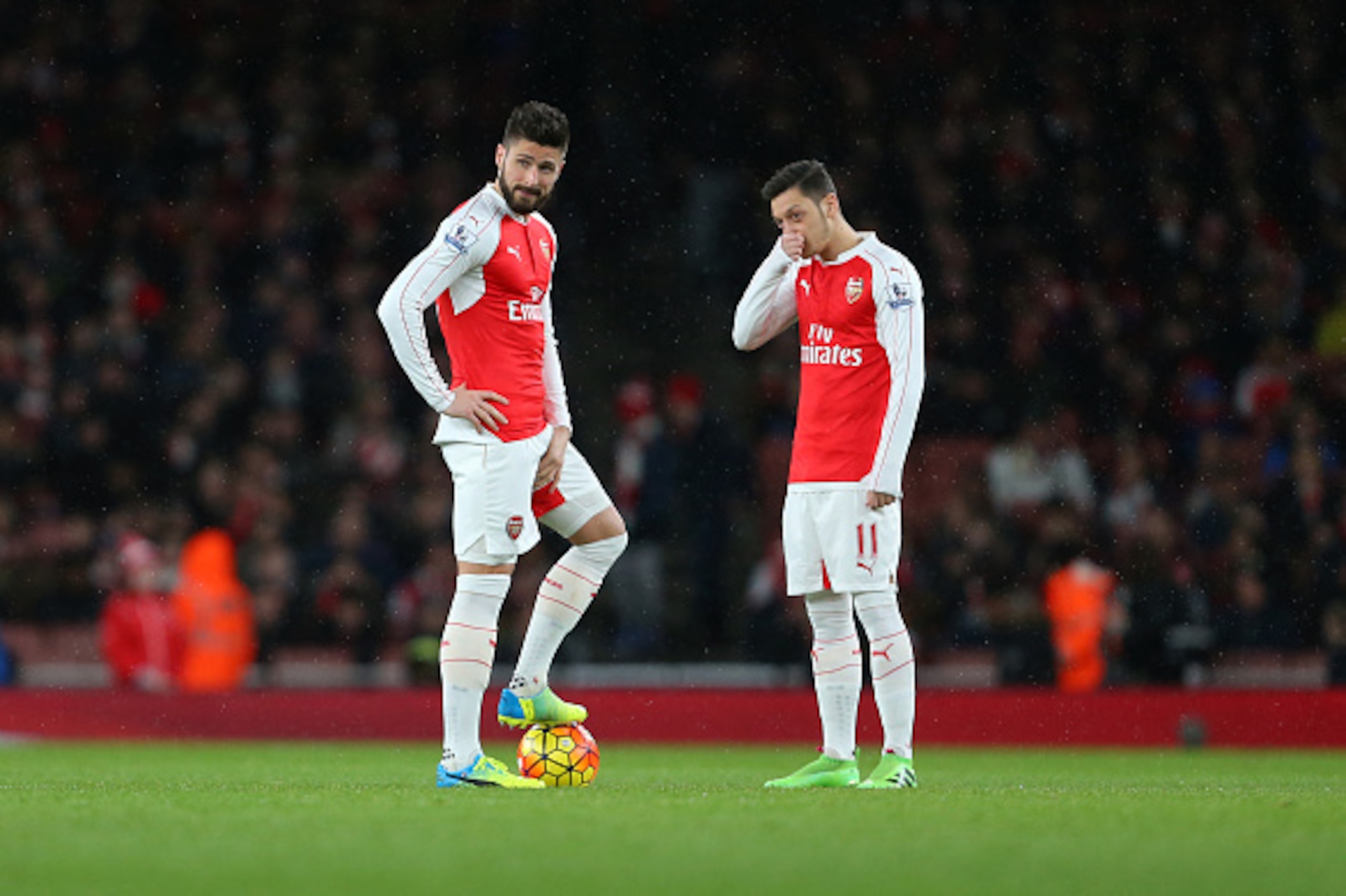 LONDON, ENGLAND - MARCH 02 :  Olivier Giroud and Mesut Ozil of Arsenal during the Barclays Premier League match between Arsenal and Swansea City at the Emirates Stadium on March 02, 2016 in London, England.  (Photo by Catherine Ivill - AMA/Getty Images)
