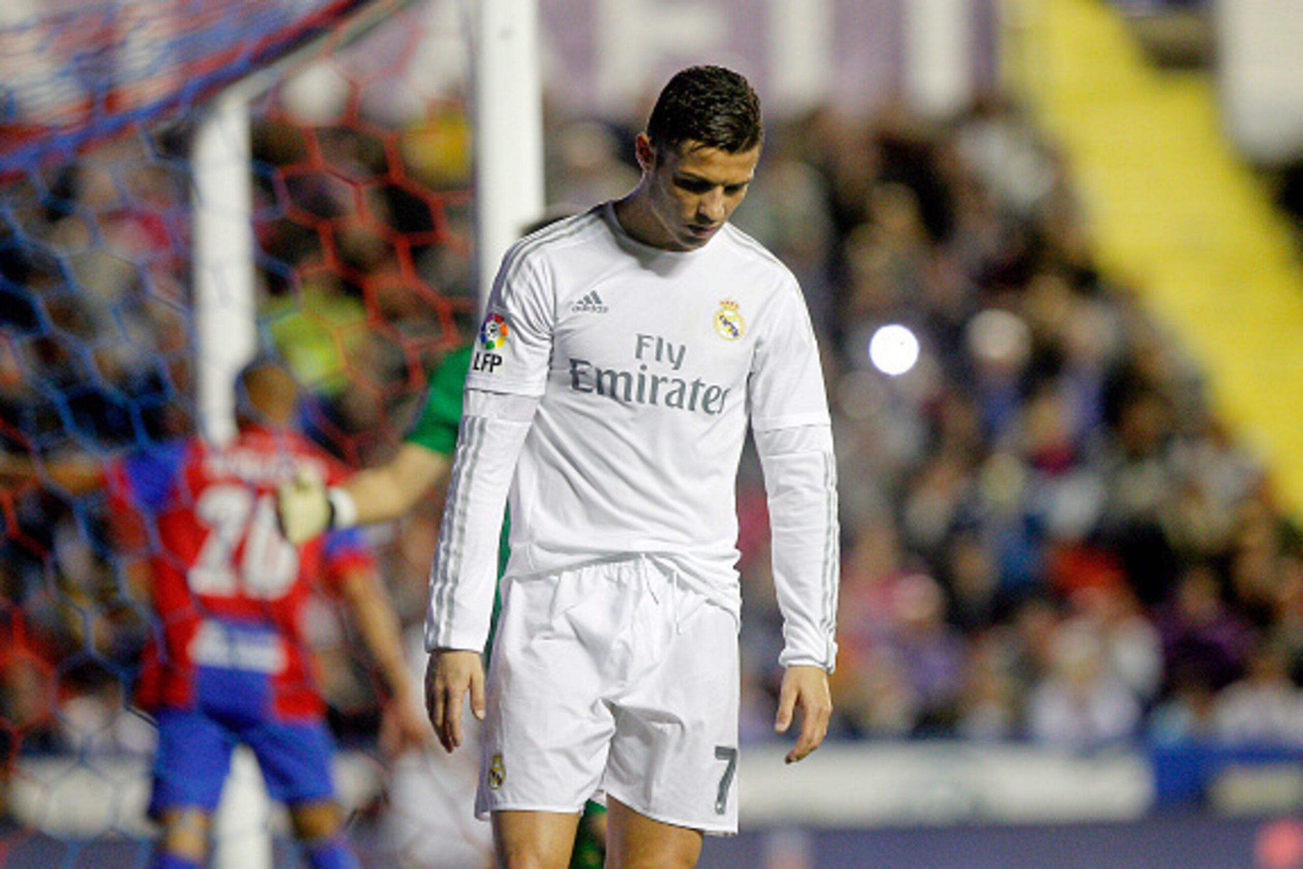 Real Madrid's Portuguese forward Cristiano Ronaldo looks down after missing a goal during the Spanish league football match Levante UD vs Real Madrid CF at the Ciutat de Valencia stadium in Valencia on March 2, 2016. / AFP / Jose Jordan        (Photo cred
