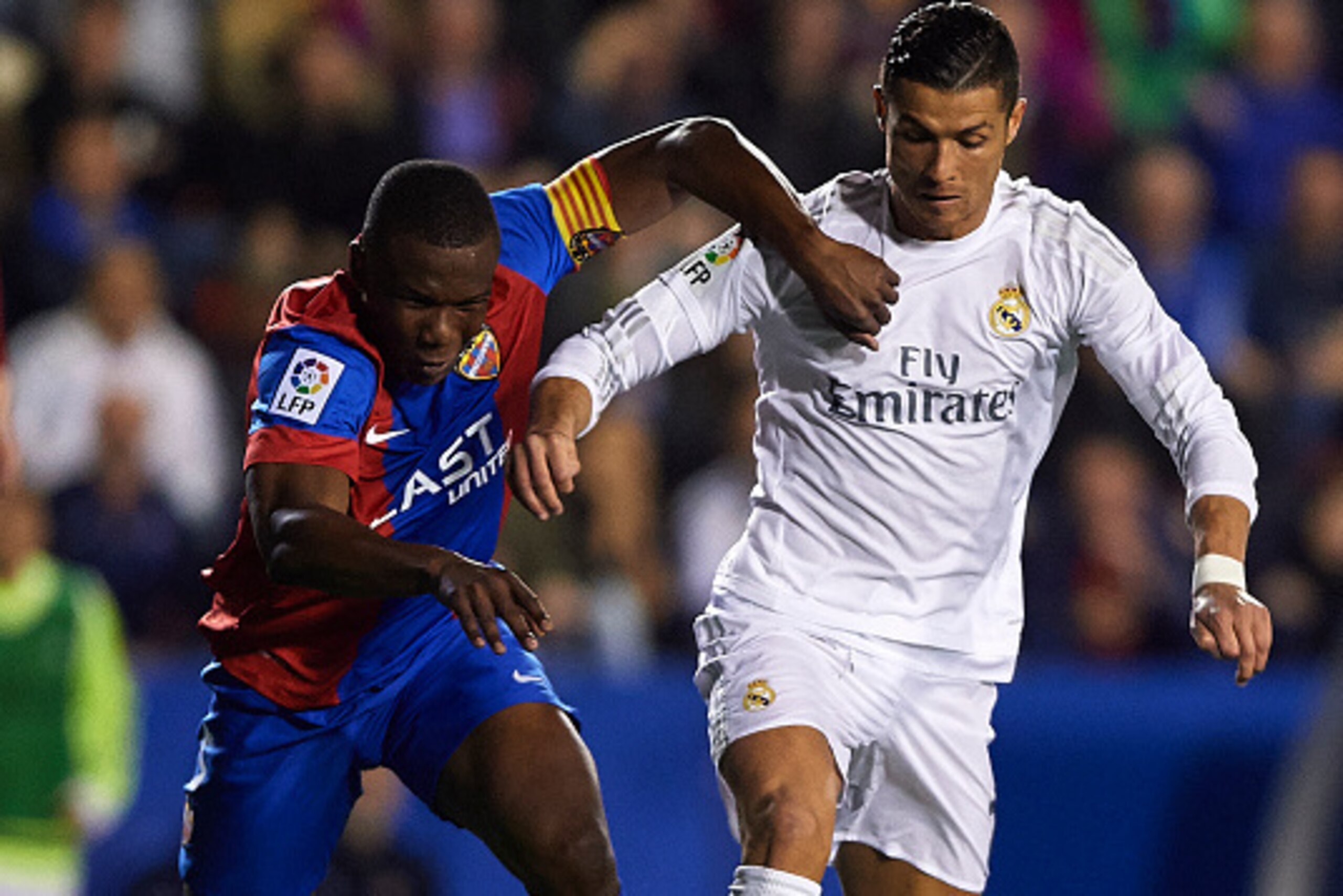 VALENCIA, SPAIN - MARCH 02:  JSimao Mate (L) of Levante competes for the ball with Cristiano Ronaldo of Real Madrid during the La Liga match between Levante UD and Real Madrid at Ciutat de Valencia on March 02, 2016 in Valencia, Spain.  (Photo by Manuel Q